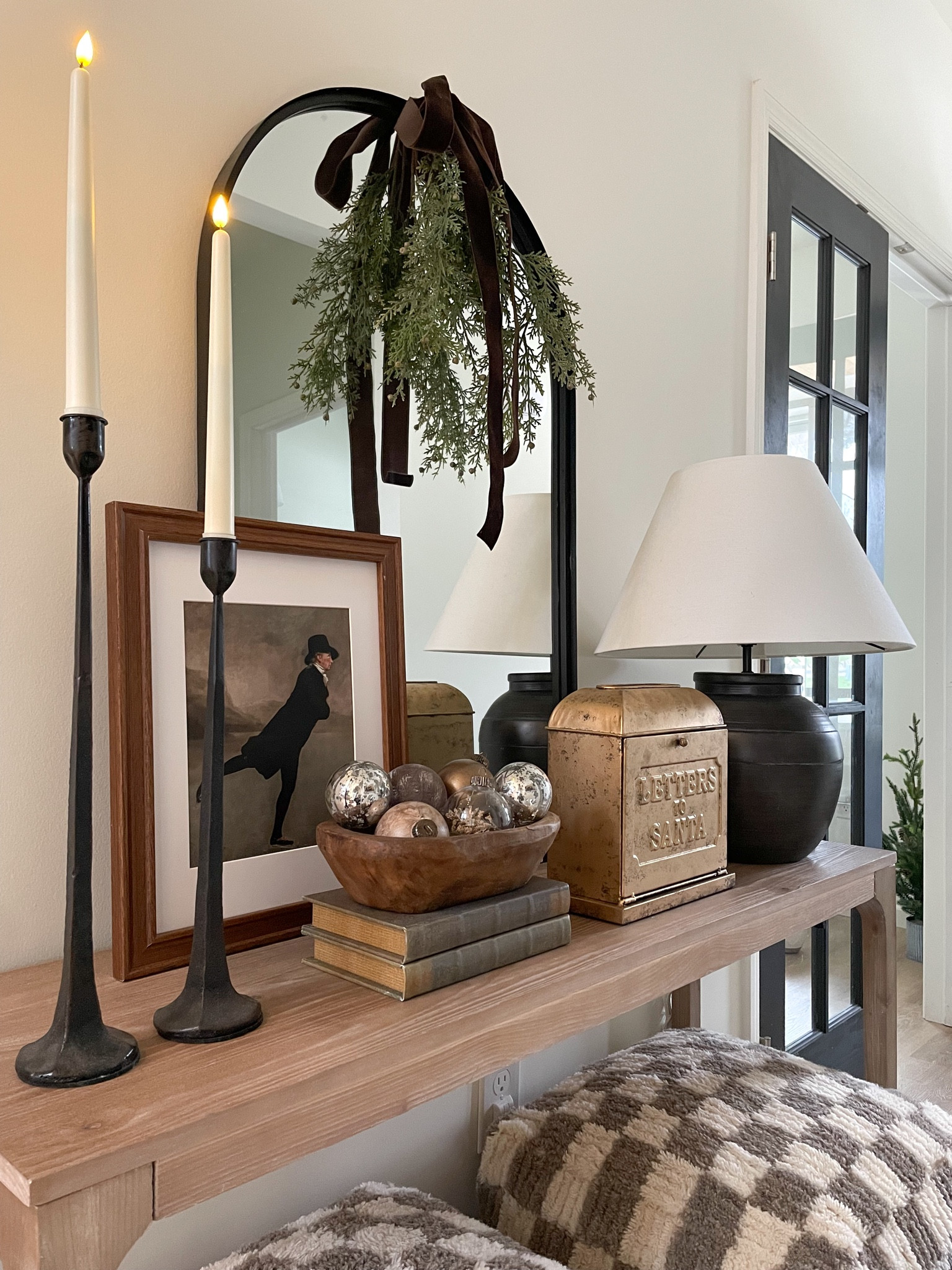 Holiday console, winter decor, styling books, frame, holiday art, candle, tapers, battery operated tapers, Santa letters, Santa decor, ornament diy, lamp, console styling, checkered decor, pouffs, holiday swag

#LTKHoliday #LTKfindsunder50 #LTKhome