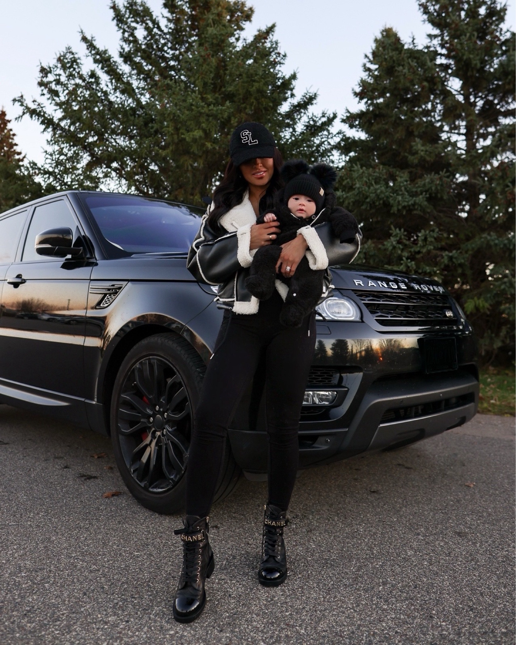 Winter travel outfit 
AllSaints combat boots - similar look and vibe to my Chanel combat boots 
Shearling biker jacket wearing an XS
Baby beanie and snow suit via Amazon


#LTKSeasonal #LTKShoeCrush #LTKFindsUnder100