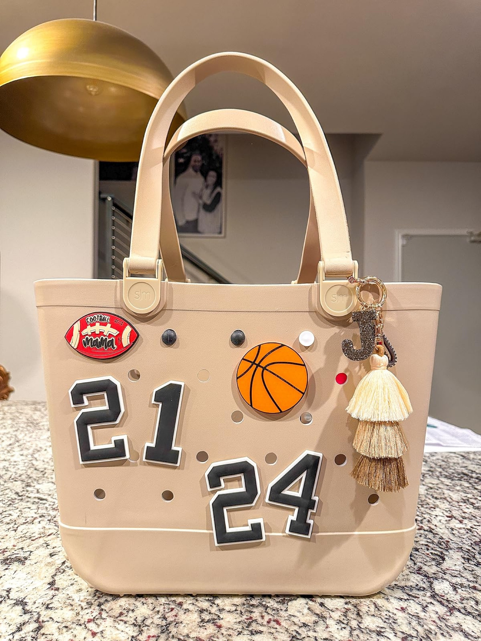 Love this sport/beach bag! Perfect for moms on the go - easy clean up and fun to accessorize! 

#LTKSummerSales #LTKSeasonal #LTKSwim