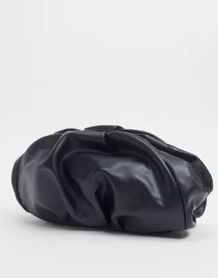 ASOS DESIGN oversized ruched clutch bag in black | ASOS (Global)