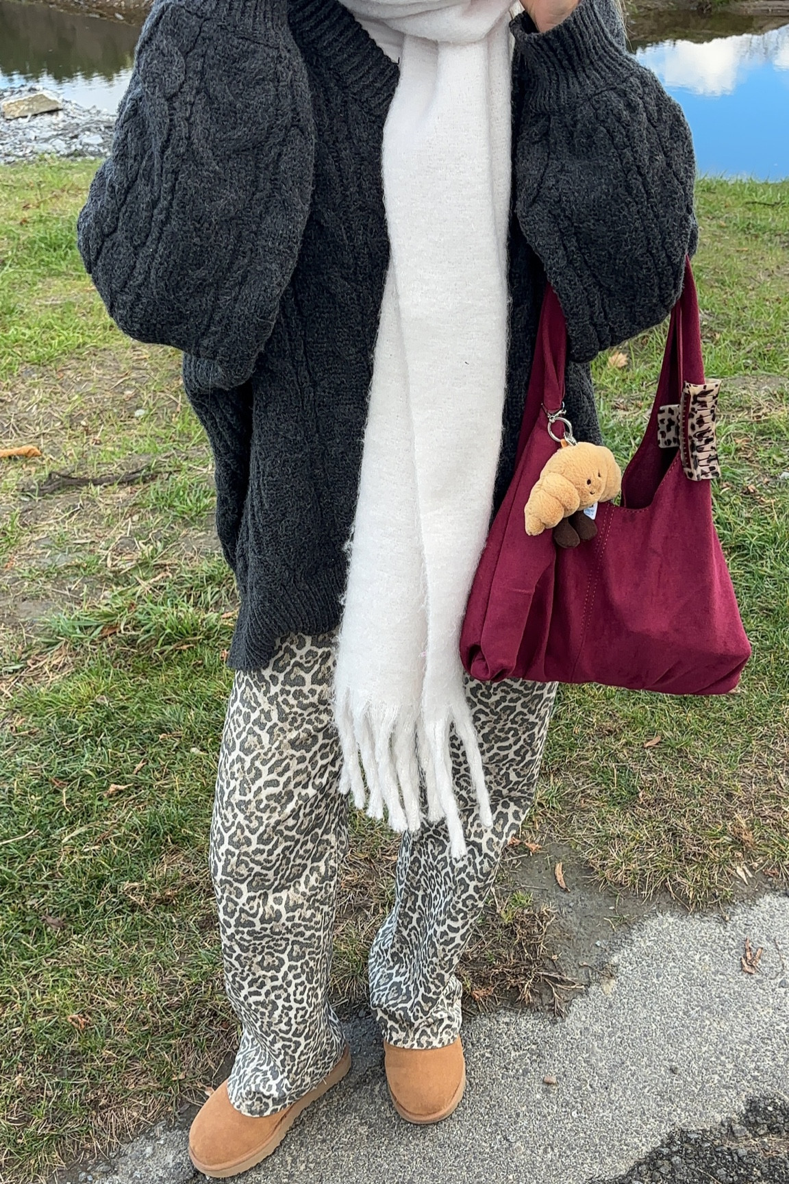 cozy winter outfit:
• dark charcoal grey cable knit oversized sweater
• burgundy mauve bag 
• leopard print pants
• ugg slippers
• chunky white wool scarf

#LTKStyleTip #LTKSeasonal #LTKFindsUnder100