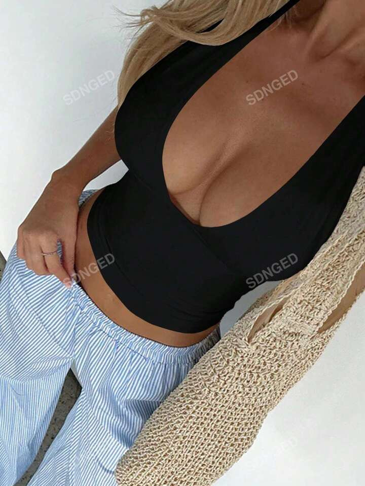 $5.19     
    $6.19
   
  -16%
       Women V-Neck Halter Solid Color Minimalist Casual Top4.97(... | SHEIN
