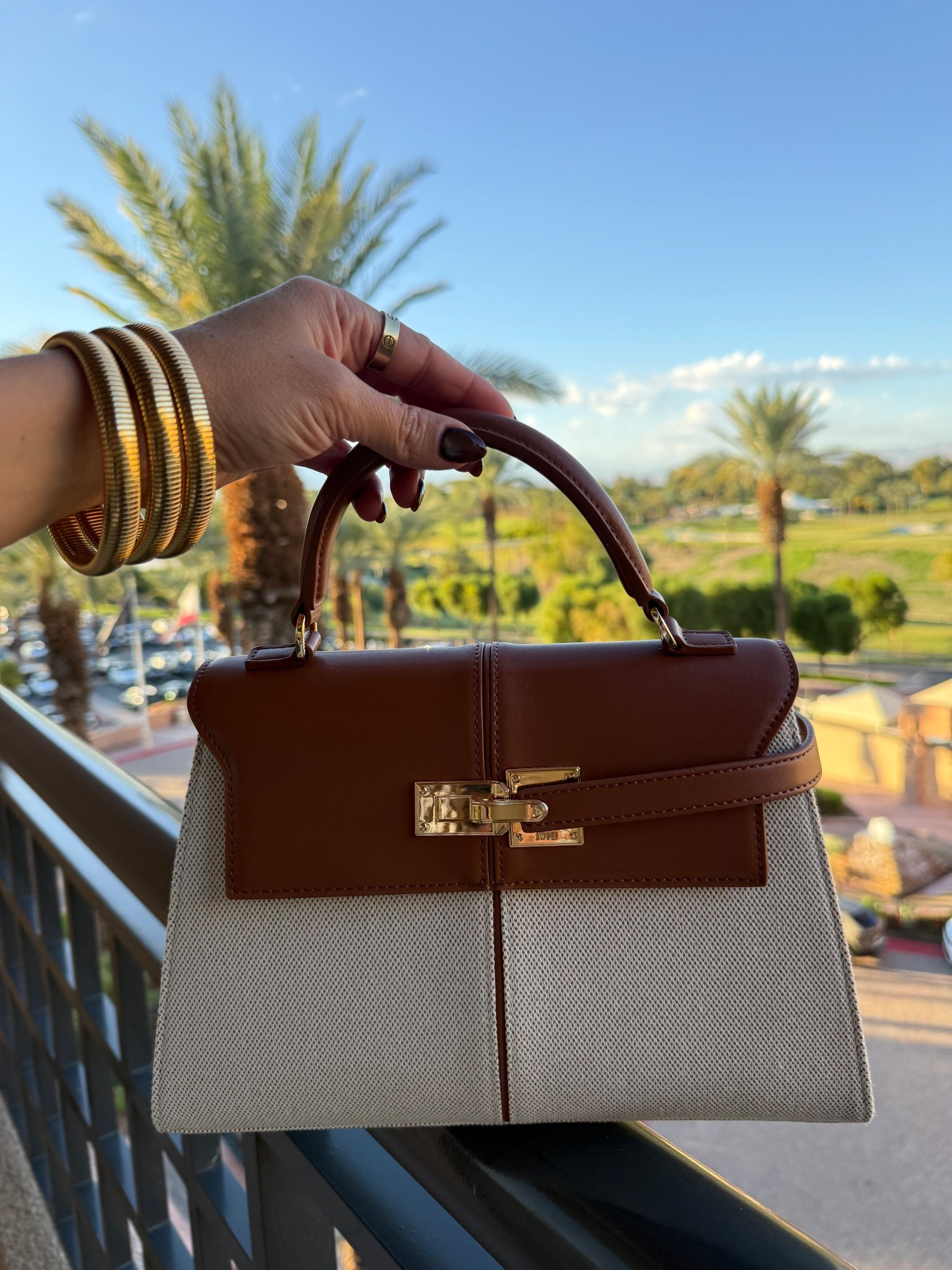 I absolutely love this bag I got from Amazon! It has gone with everything and it’s under $100. Love the structure and the size! 

#LTKFindsUnder100 #LTKStyleTip