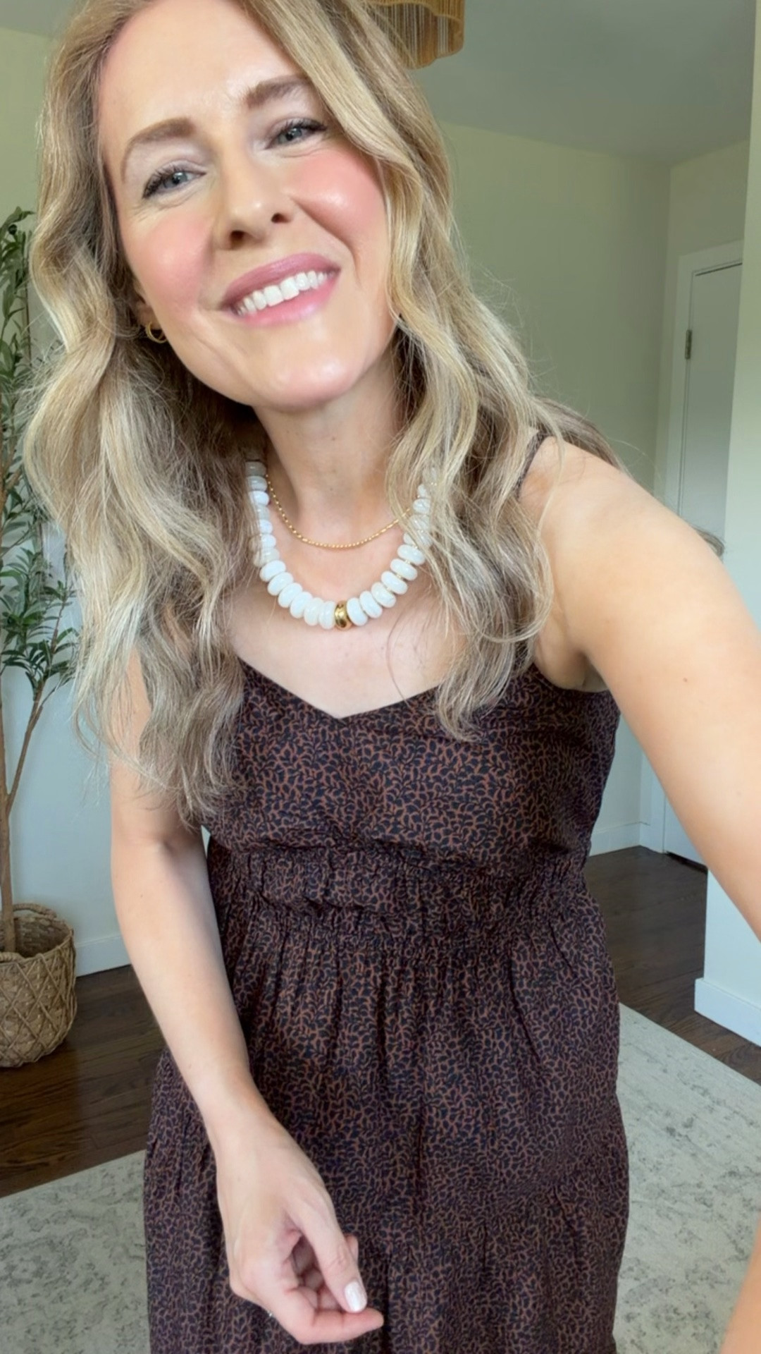 I recorded this when we had several days in a row in the 80s and 90s and nothing is cooler than a spaghetti strap cotton sundress! This one is so pretty and I love the brown and black print. Fits true to size, I’m a small. #walmartfashion