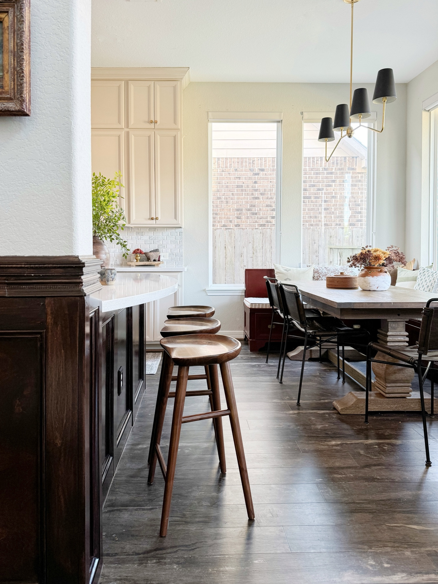 Pub style wall paneling for my kitchen island! Walnut wood barstools for those mid century modern vibes! All trim pieces linkedd

#LTKStyleTip #LTKHome #LTKFindsUnder100
