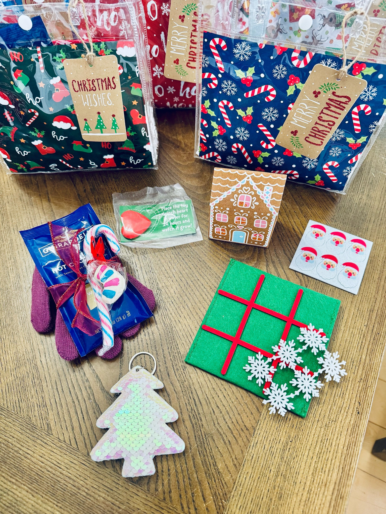 🎄✨ Spread Some Holiday Cheer in the Classroom! 🎁❄️

This season, I put together these festive gift bags for my children’s classes, and they are filled with holiday magic! 🎅🌟 If you're looking to bring a little extra joy to your kid’s classmates or students, here's some inspiration:

🎲 Tic Tac Toe with snowflake & Santa pieces
🧤 Warm Gloves with a hot chocolate packet & candy cane
🔑 Sequin Holiday Keychain
❤️ The Grinch Heart that grows 3 sizes when added to water
🍬 Gingerbread House Box filled with chocolate treats

These little surprises are sure to bring smiles and create lasting memories. Let’s make the classroom feel even more special this holiday season! 🎉

✨ What fun holiday treats are you adding to your gift bags? Share your ideas and let's spread the joy! ❤️🎄

#HolidayClassroomGifts #SeasonOfGiving #SpreadJoy #ClassroomInspiration #TisTheSeason

#LTKGiftGuide #LTKKids #LTKHoliday