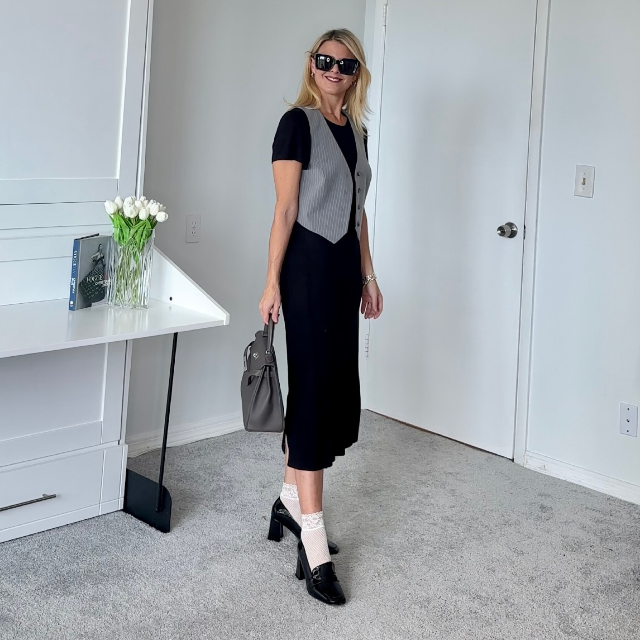 T-shirt dress styled with a vest loafers and socks for early fall. 

#LTKFind #LTKSeasonal #LTKunder50