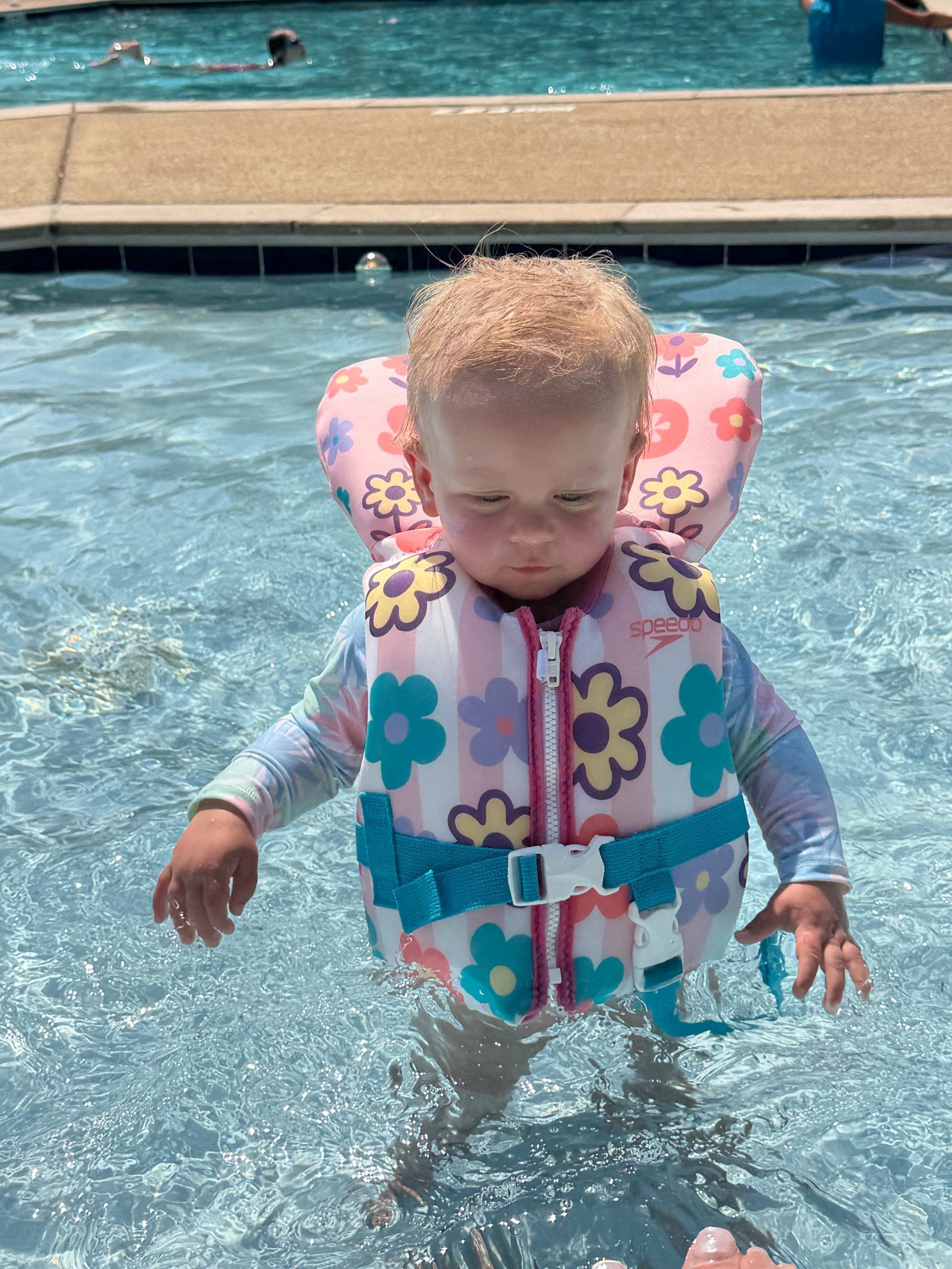 First swim in the books and feeling much safer with this infant life jacket!