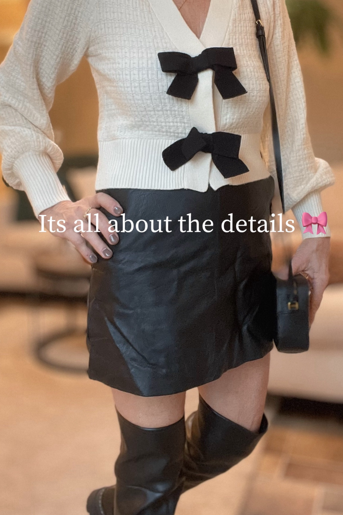 Buttons and bows or bows for buttons ?! How cute is this sweater from @express ?  My sweater is currently 40% off right now !! 

#LTKstyletip #LTKfindsunder100 #LTKHoliday