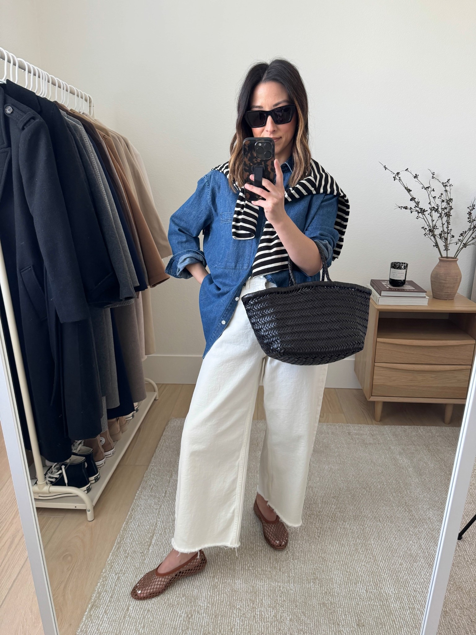 How to style denim shirts in 2025. Make the chambray less dated. This one from AYR is the BEST. amazing color and fit. 

AYR shirt xs
Madwell long sleeve xs (old)
Everlane curve jeans 26. Sized up 2 sizes and cut hems
Staud flats 35
Dragon Diffusion triple jump small
YSL Sunglasses
J.Crew earrings
Dorsey James necklace 15"

#LTKShoeCrush #LTKItBag #LTKPetite