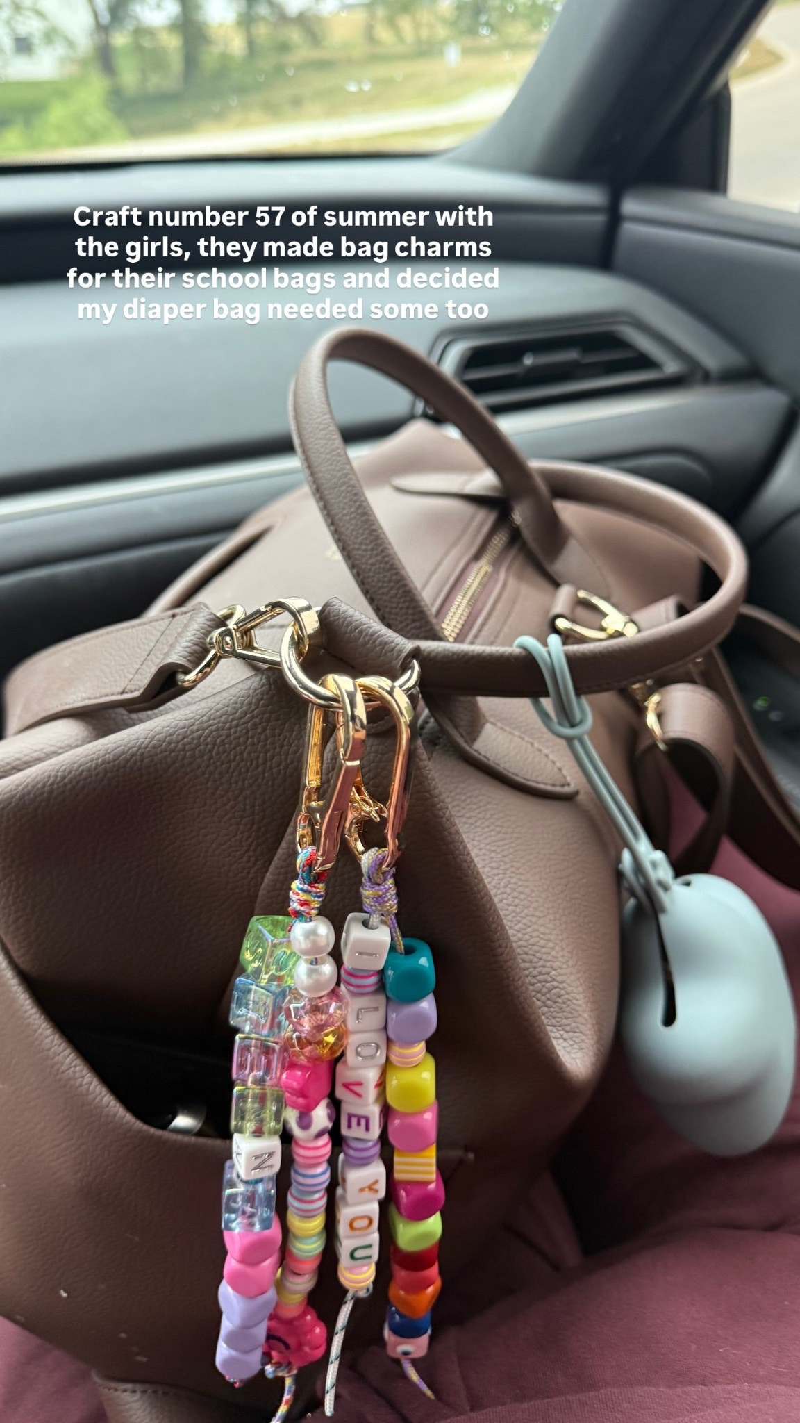 Craft number 57 of summer with the girls, they made bag charms for their school bags and decided my diaper bag needed some too