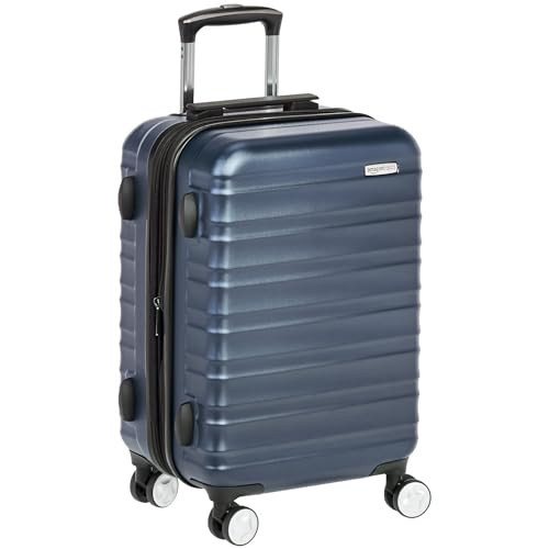 Amazon Basics 21-inch Carry On Luggage, Suitcase With Wheels (8 Spinner Wheels), TSA Lock, Expandable Capacity, Interior Divider and Pocket For Dry and Damp Clothes, Navy Blue | Amazon (US)