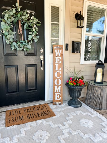 Front porch idea: have you started decorating your front porch yet for summer? When I added a huge outdoor area rug under my doormat I feel like my front porch became so cozy. 

#LTKFindsUnder50 #LTKSeasonal #LTKHome