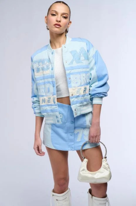 BRUISED NEVER BROKEN BOMBER IN BLUE | AKIRA