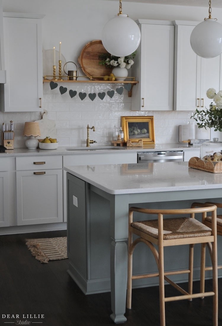 Green and white kitchen with heart garland...

#LTKSeasonal #LTKHome #LTKValentine
