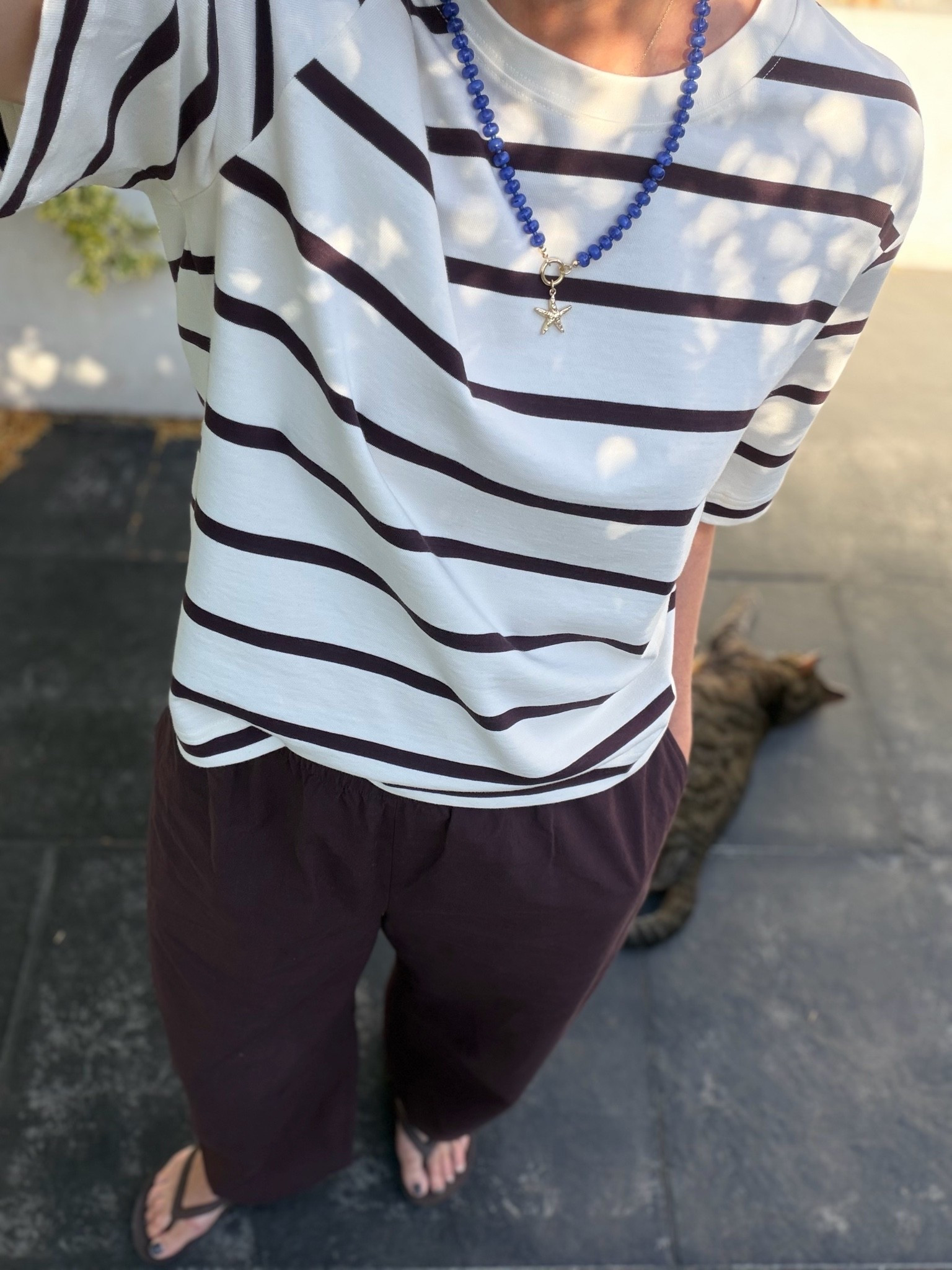 Today’s look (cat optional) 
I love this tee - I have it in plain colours too but I love this brown stripe. The fabric and sleeve length are so good and these poplin trousers are really comfy and come in other colours x 
I wear a small in both x

#LTKsummer #LTKstyletip