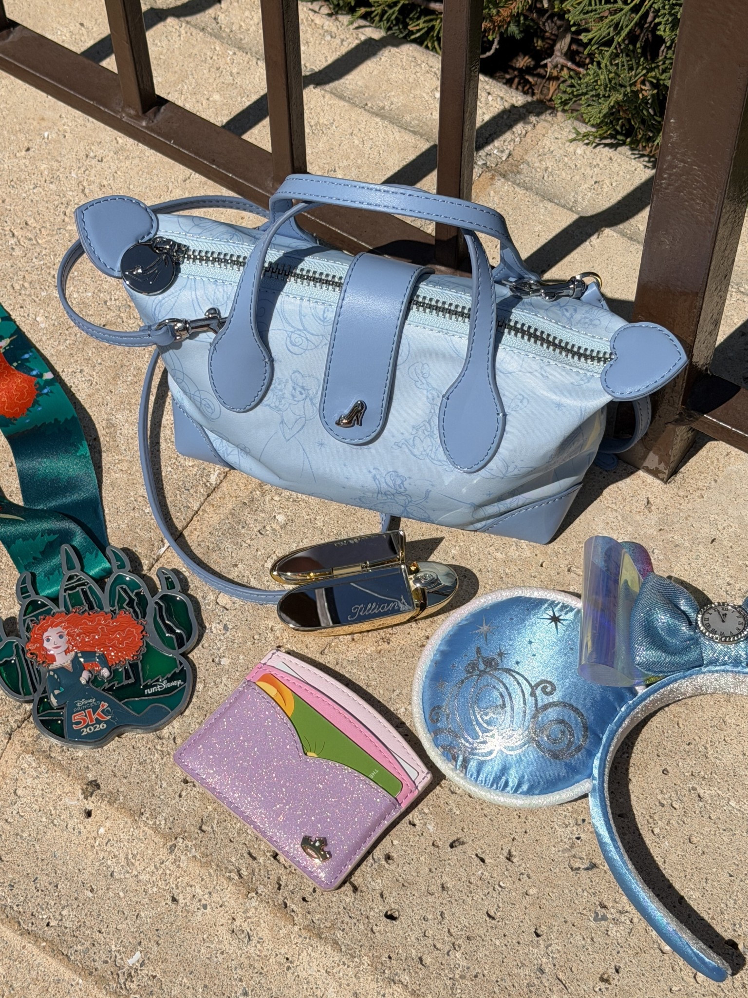 Magic Kindgom accessories ✨

Purse: Stoney Clover Lane Cinderella pouchette 
Card holder: Stoney Clover Lane
Cinderella ears: Disney Store/Disneyland 
Pin board: gopinpro (not pictured) 
Lipstick: Guerlain 

Ig: @jkyinthesky 

#stoneyclover #disney #disneyworld #wdw #waltdisneyworld #disneystyle #disneyaccessories #disneyprincess #disneyprincessstyle #disneyprincesses #disneyaesthetic #disneyvibes #rundisney #magickingdom #disneyootd #disneyoutfit #disneyoutfits #disneyblogger #disneyinfluencer #cinderella 

#LTKootd #LTKdayinmylife #LTKgrwm