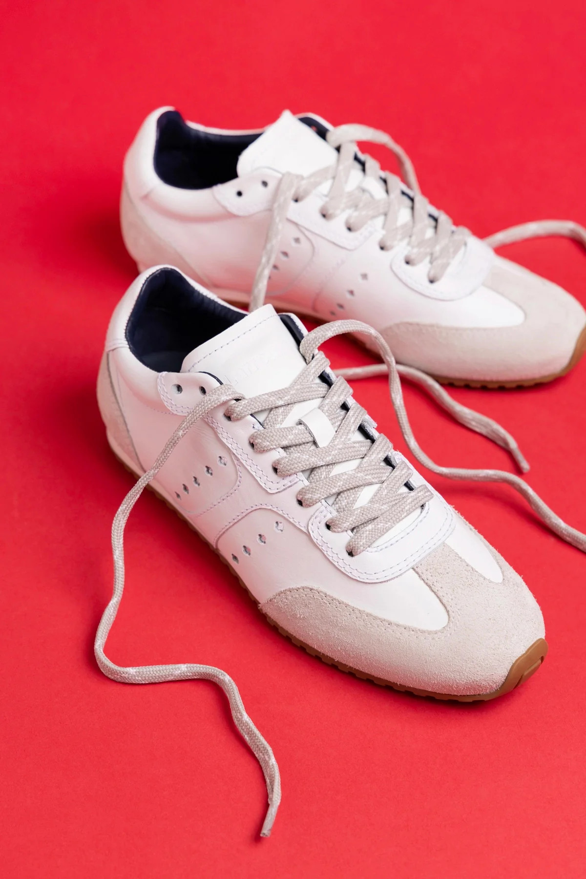 Stella Sneaker In White Leather | Larroude