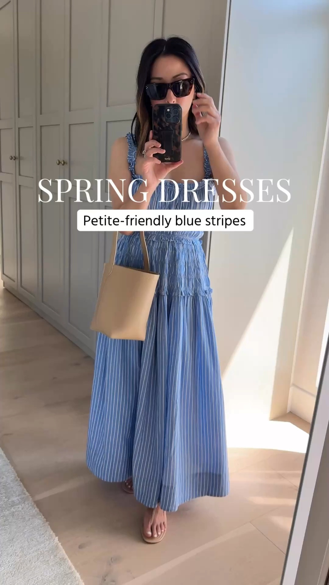 Spring dresses- this striped doen dress is so beautiful 💙

Doen dress xs
The row park tote small
Mango sandals 
Celine sunglasses 
Dorsey necklace  

Petite style, spring outfits 2026, spring style, spring dresses 

#LTKootd #LTKPetite #LTKSeasonal
