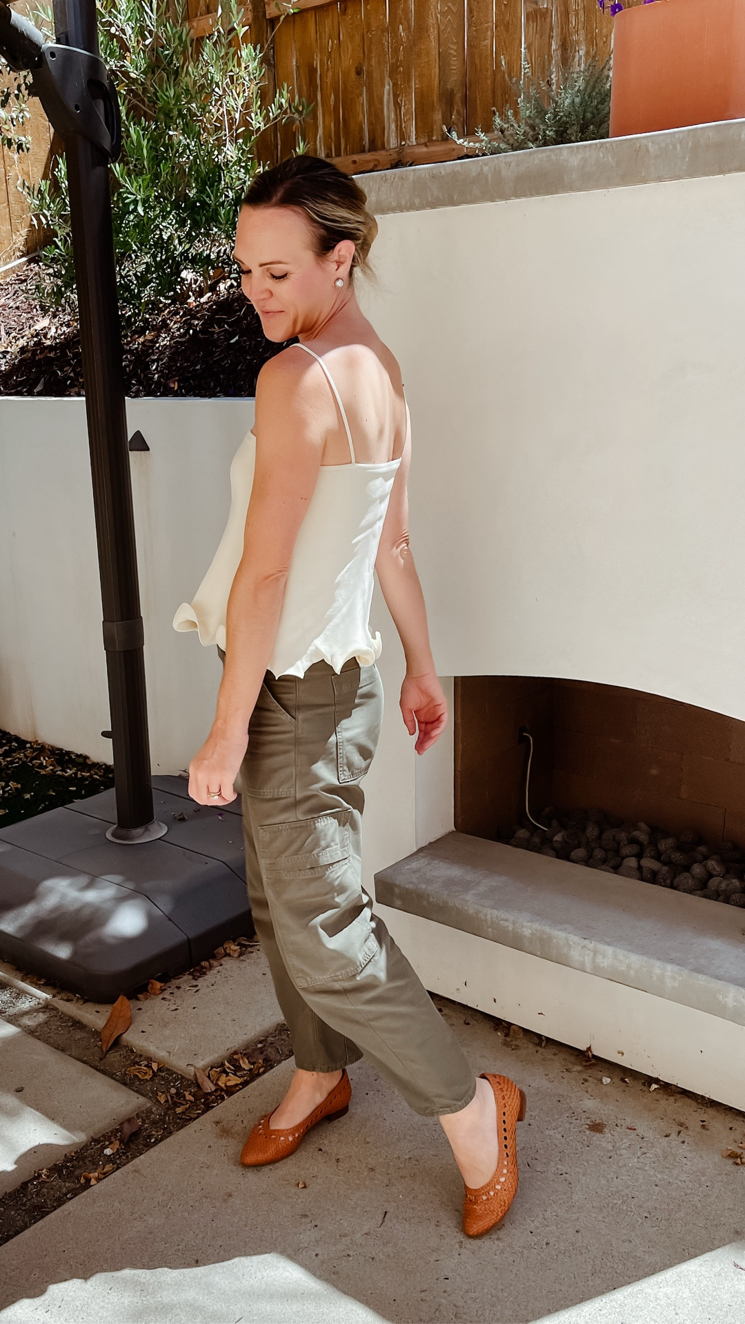 Obsessed with this tank. Wearing a small in the cream color. It comes in black, pink, green, and brown. 