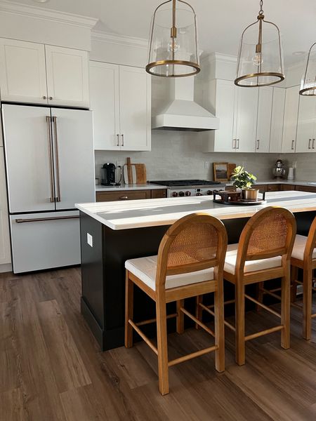Love these amazing Nathan James cane counter height stools, kitchen pendant lighting from Wayfair, and my cafe appliances! 

#LTKMostLoved #LTKstyletip #LTKhome