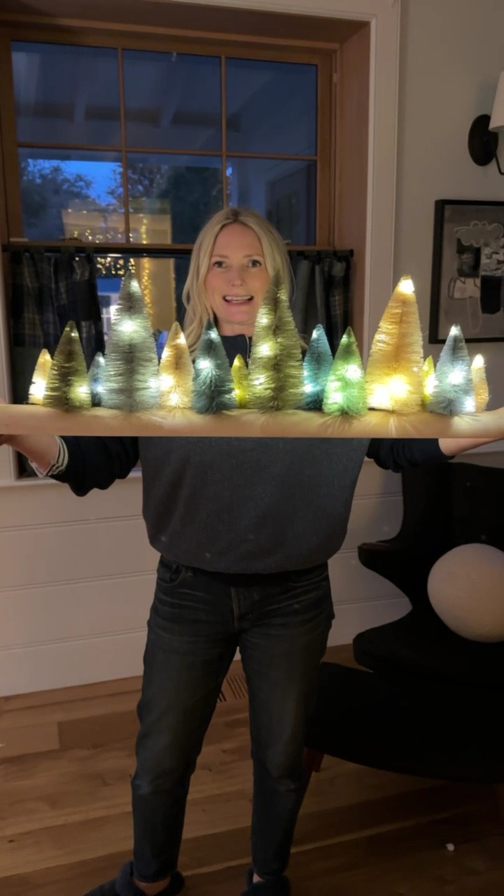 INSTANT CHEER. No need to fuss over the perfect bottle brush tree display - this single piece makes decorating your windows (or your tables, or your mantel, or your credenza, or your bookshelves…you get it) a total breeze. Turn it on, place it, and enjoy the ambience. SO GOOD.

#LTKhome #LTKVideo #LTKHoliday