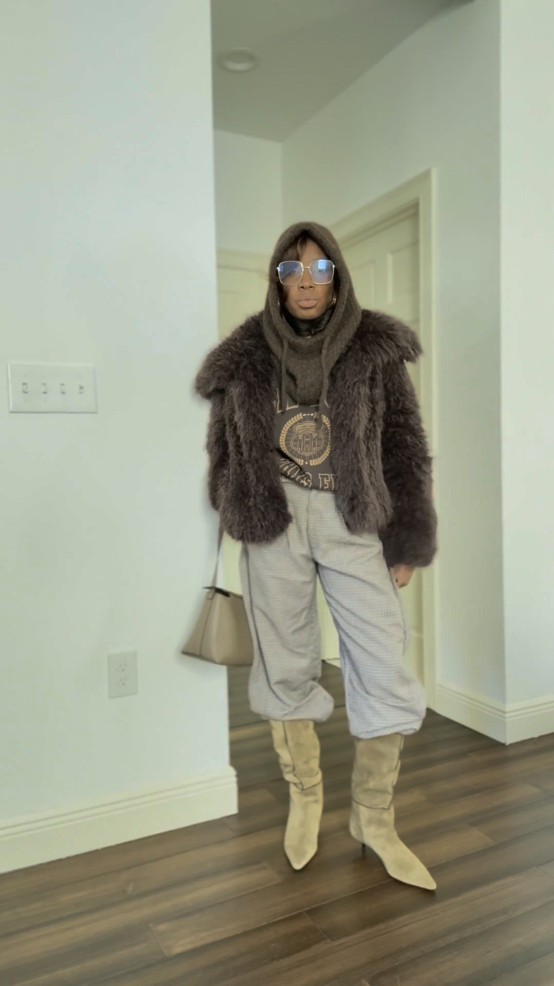 What I’m packing for Switzerland. Fur coat outfit, barrel leg pants, suede boots, graphic sweatshirt 

#LTKootd #LTKPetite #LTKTravel