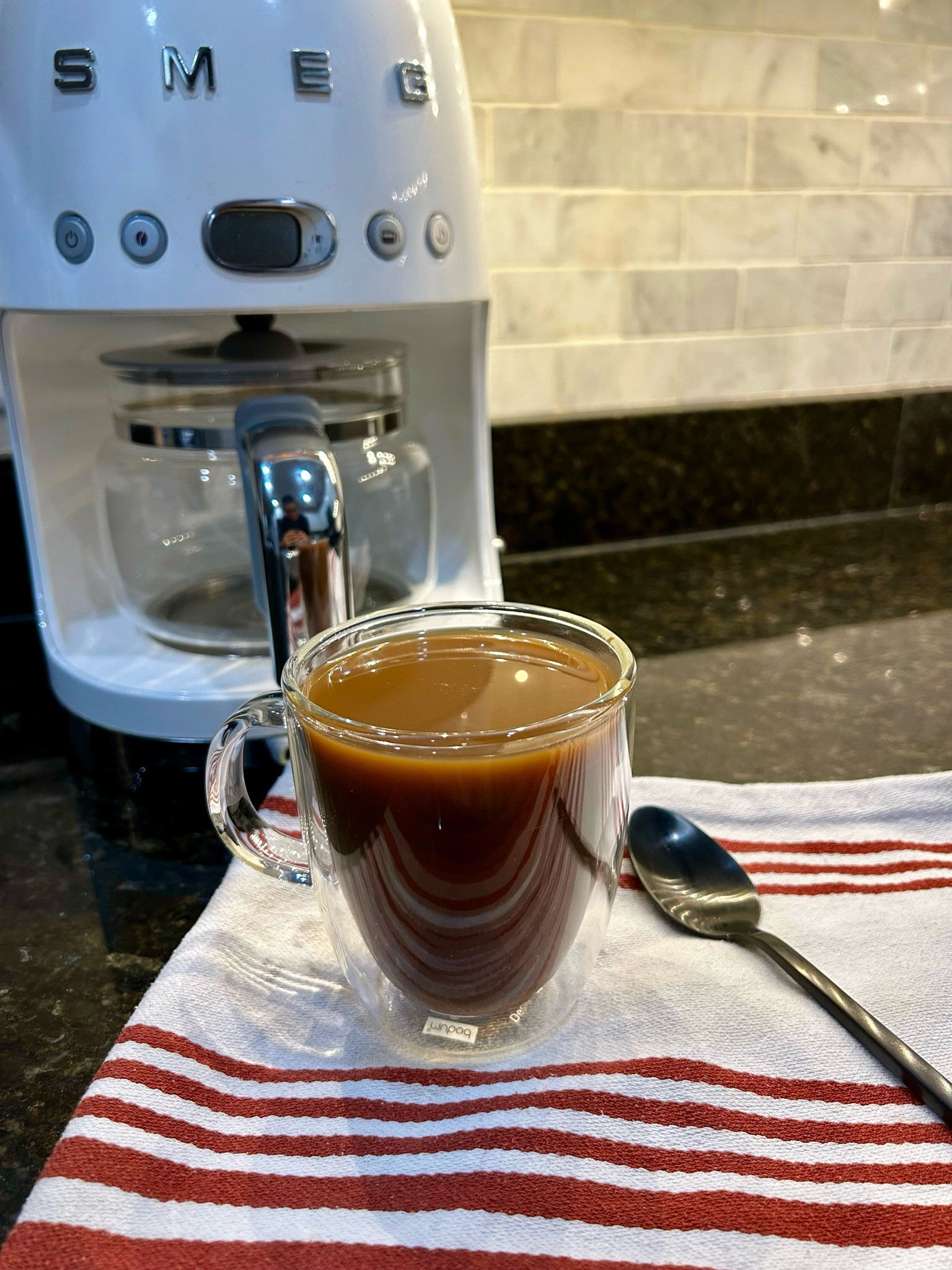 36 weeks pregnant today and reallllllllyyyy making the one cup of coffee per day last. 

Smeg coffee maker, clear mugs, black silverware

#LTKHome #LTKFamily