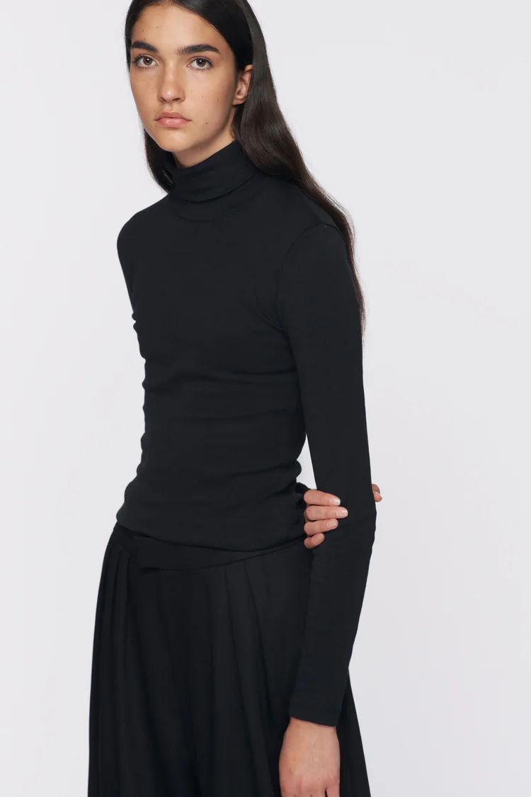 Fitted Turtleneck$454.8/5 (243 reviews)All reviewsShow reviews draweror 4 payments of $11.25 with... | Kotn