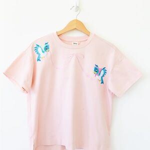 Disney Women's Light Pink Tee with Blue Bird Design | Poshmark