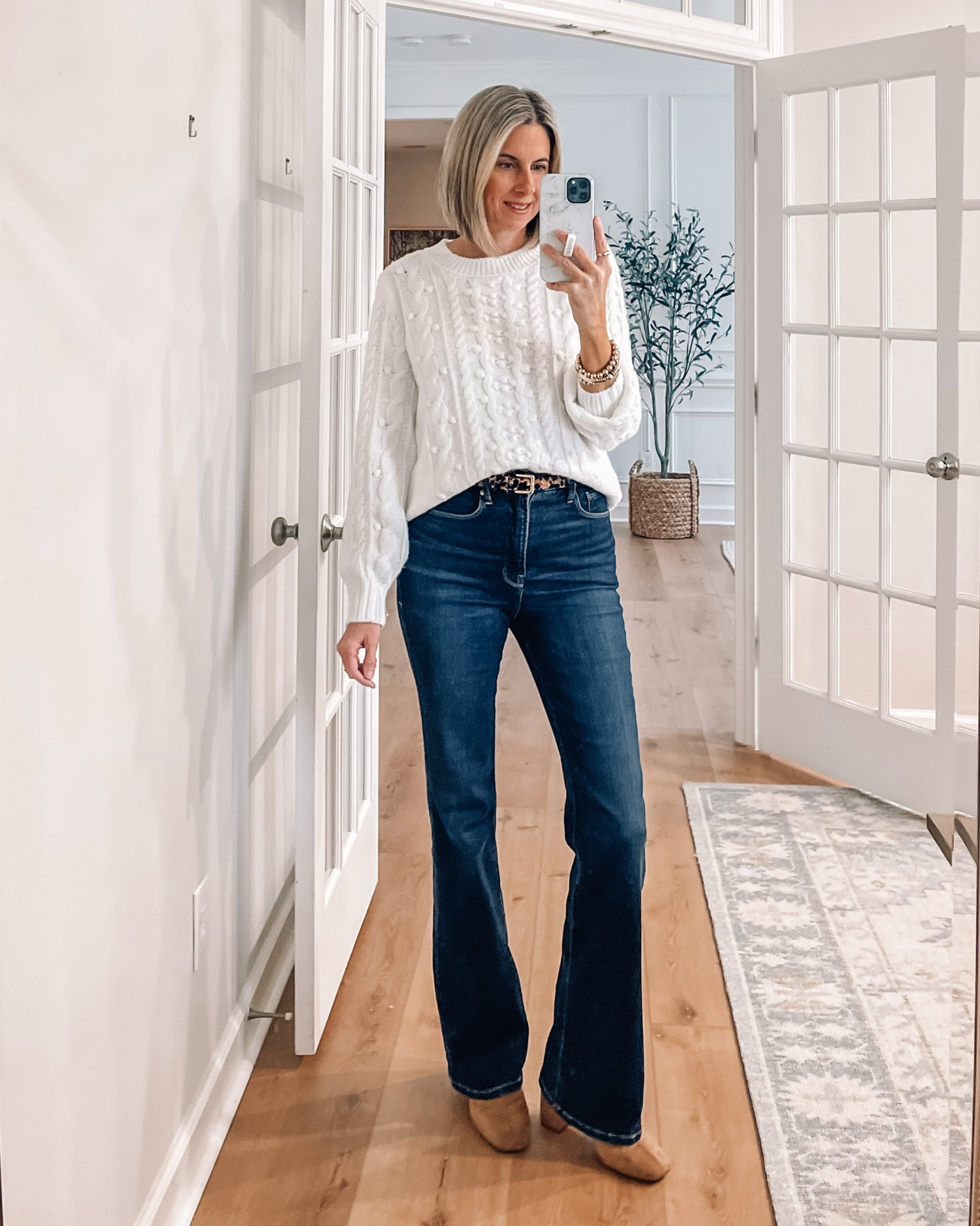 70% off White cable knit sweater 
Wearing a small
Dark wash jeans in a 4

#LTKSaleAlert #LTKStyleTip #LTKOver40