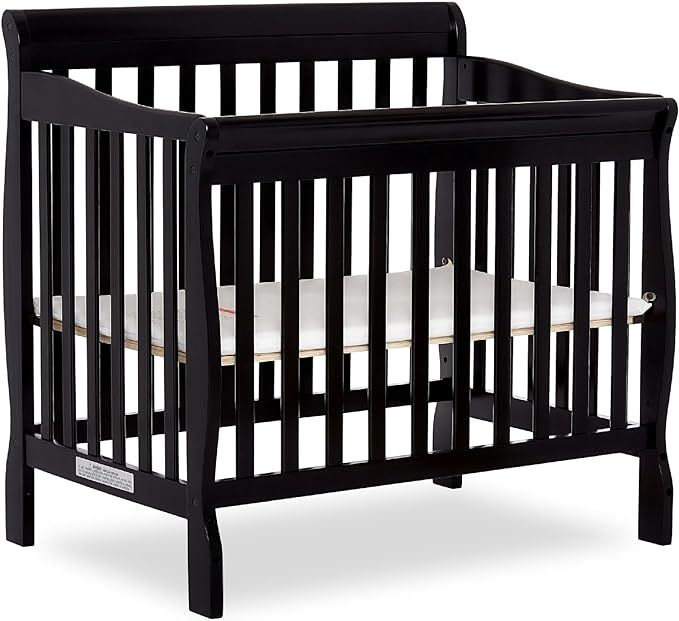 Aden 4-in-1 Convertible Mini Crib In Black, Greenguard Gold Certified, Non-Toxic Finish, New Zeal... | Amazon (US)