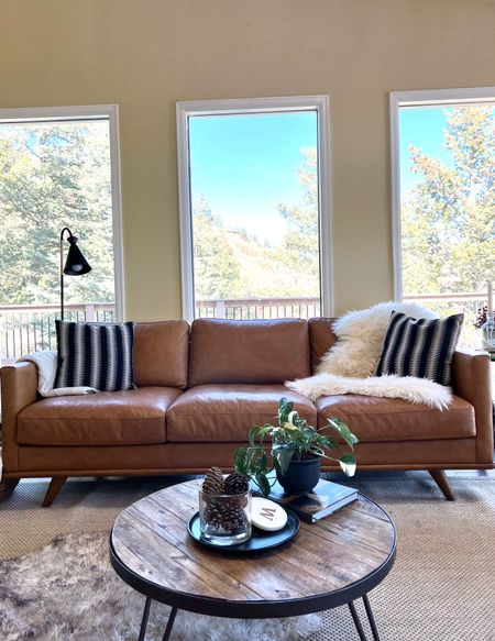 Living room decor. Scandinavian inspired living room. Leather sofa is 🔥 Looks WAY more $$ than it is. Excellent quality, soft and comfortable! 

#LTKSpringSale #LTKhome #LTKover40