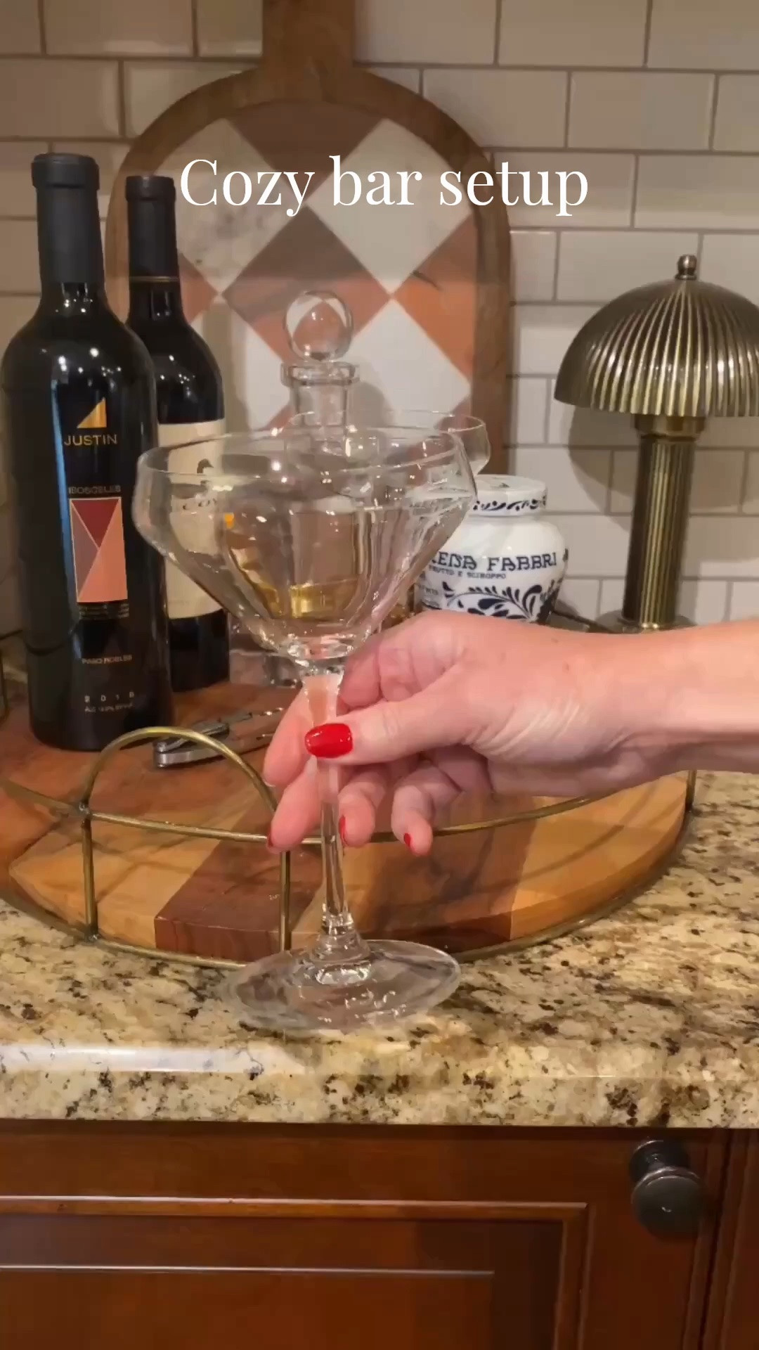 The perfect fall bar setup. Collect your favorite wine, decanter and cocktail glasses on a tray. Add garnish like these cherries or olives and some cocktail picks. And add a small lamp for the ambiance. #martiniglass #cocktailsetup #hosting #barcart #entertaining

#LTKHome #LTKSeasonal #LTKfoodie