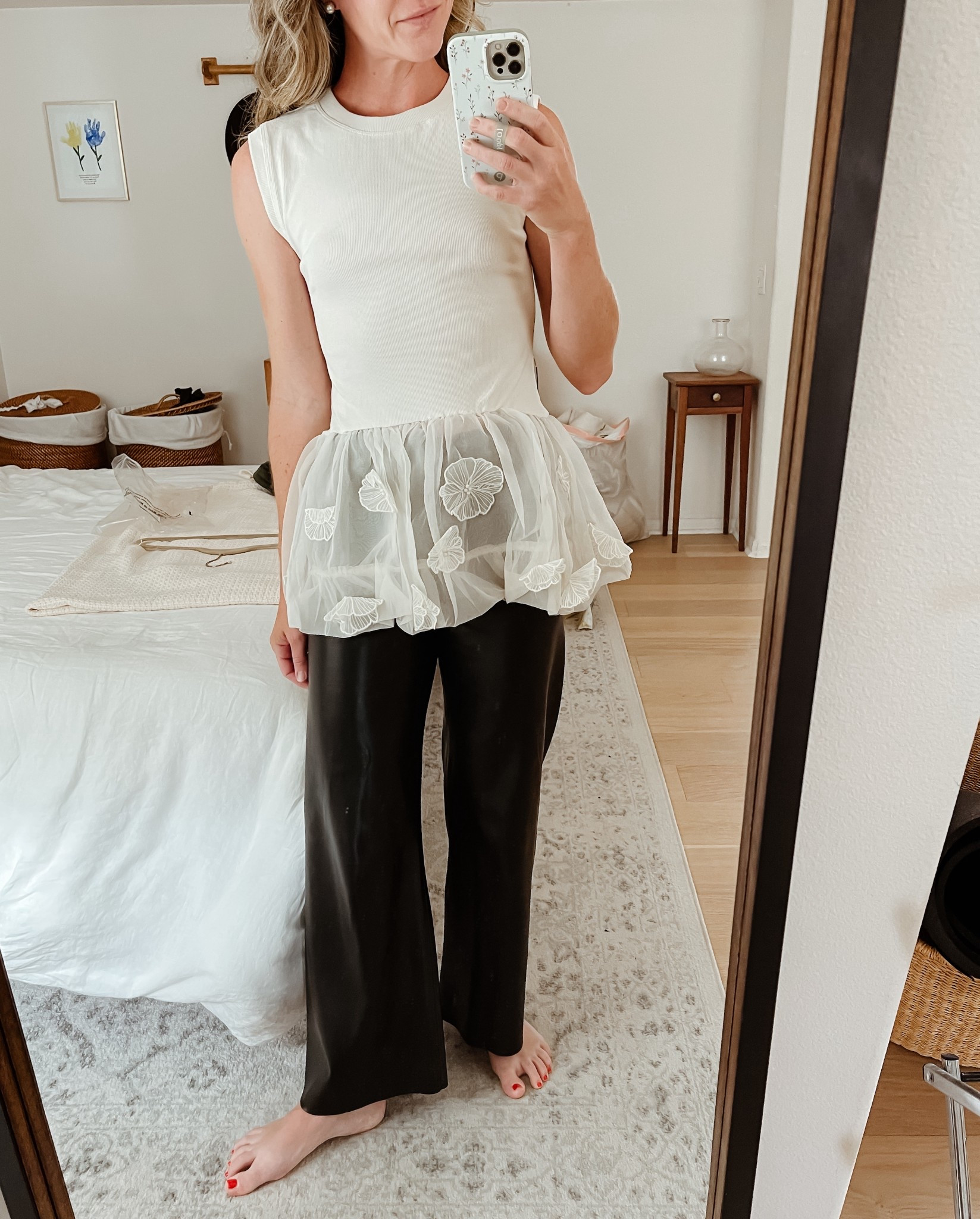 Anthropologie Peplum top. Shirt portion is a jersey rib material which is super comfy. Slightly longer fit, also comes in black and chocolate brown. Stretchy fit with some give, I’d stay TTS, wearing a small. 

#LTKOver40 #LTKFindsUnder100