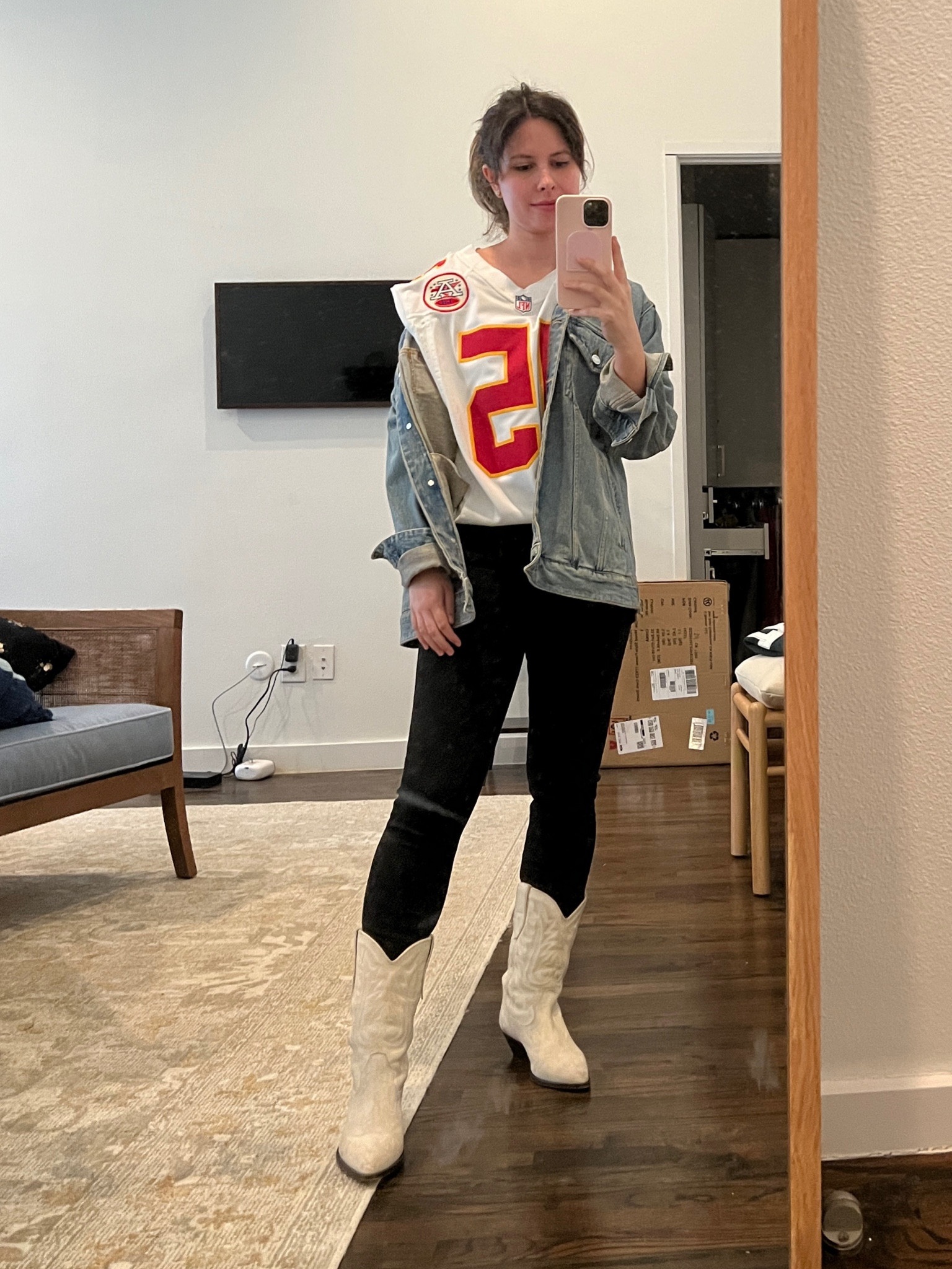 Super Bowl football game outfit, chiefs, Kansas City, football Jersey,  cowboy boots, Isabel marant, white cowboy boots, rag and bone jeans, mahomes jersey 