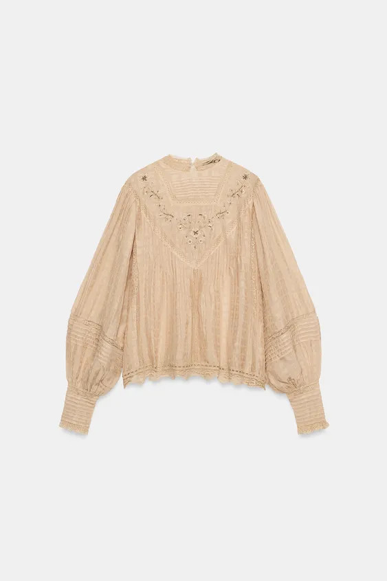 ZARA WOMAN COLLECTIONShirt made from main fabric in spun viscose. High neck and long cuffed sleev... | Zara NL