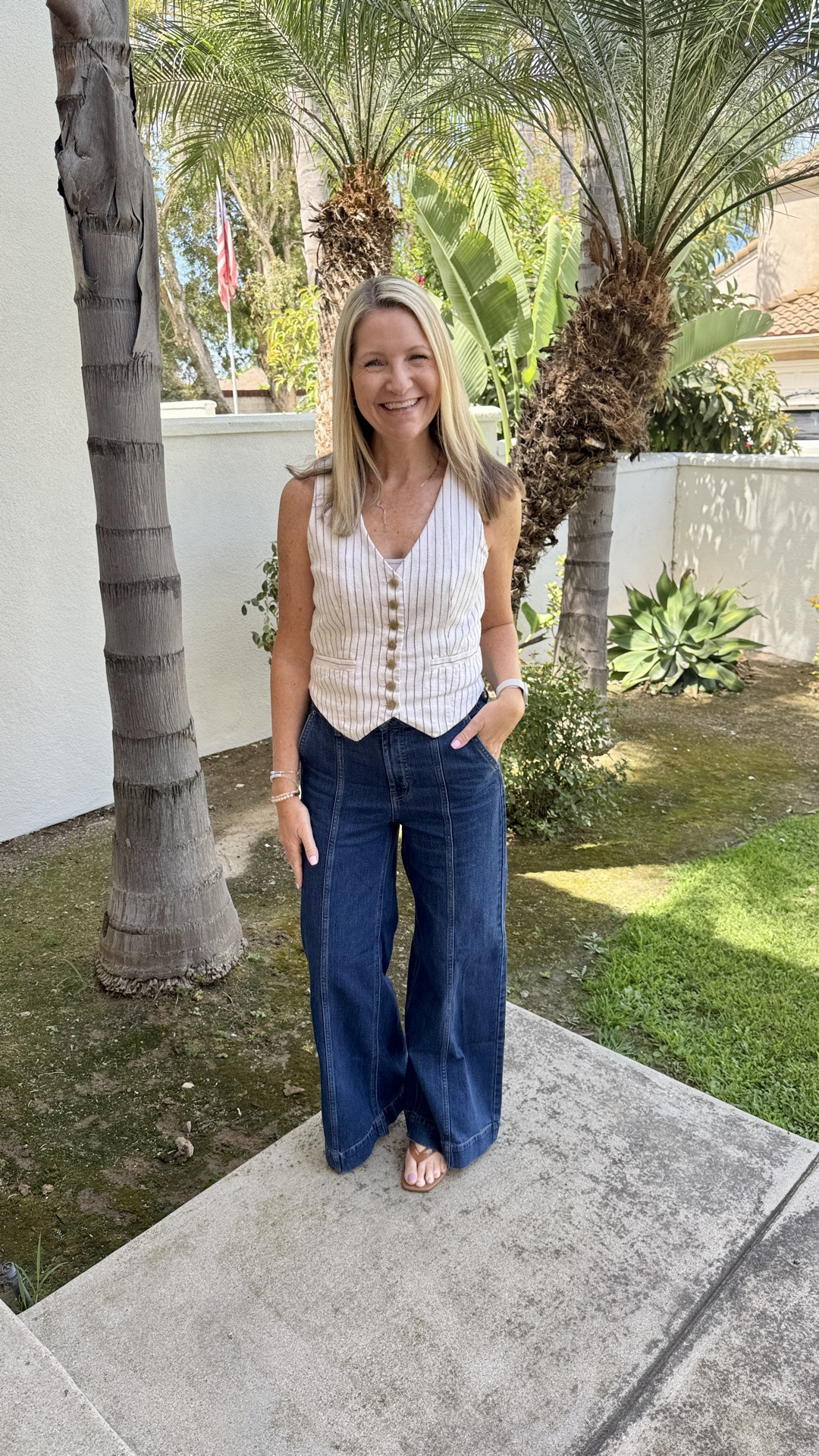 Friday Finds! I have had a pair of trouser jeans from Old Navy that have been in my closet for at least 4 or 5 years now. When I saw this updated pair with the front seams, I knew it was time for an upgrade. 
 And they are 50% off this weekend!

My striped vest is old but I linked a similar version. My kitten heel sandals are Target.

#LTKootd #LTKWorkwear #LTKSaleAlert