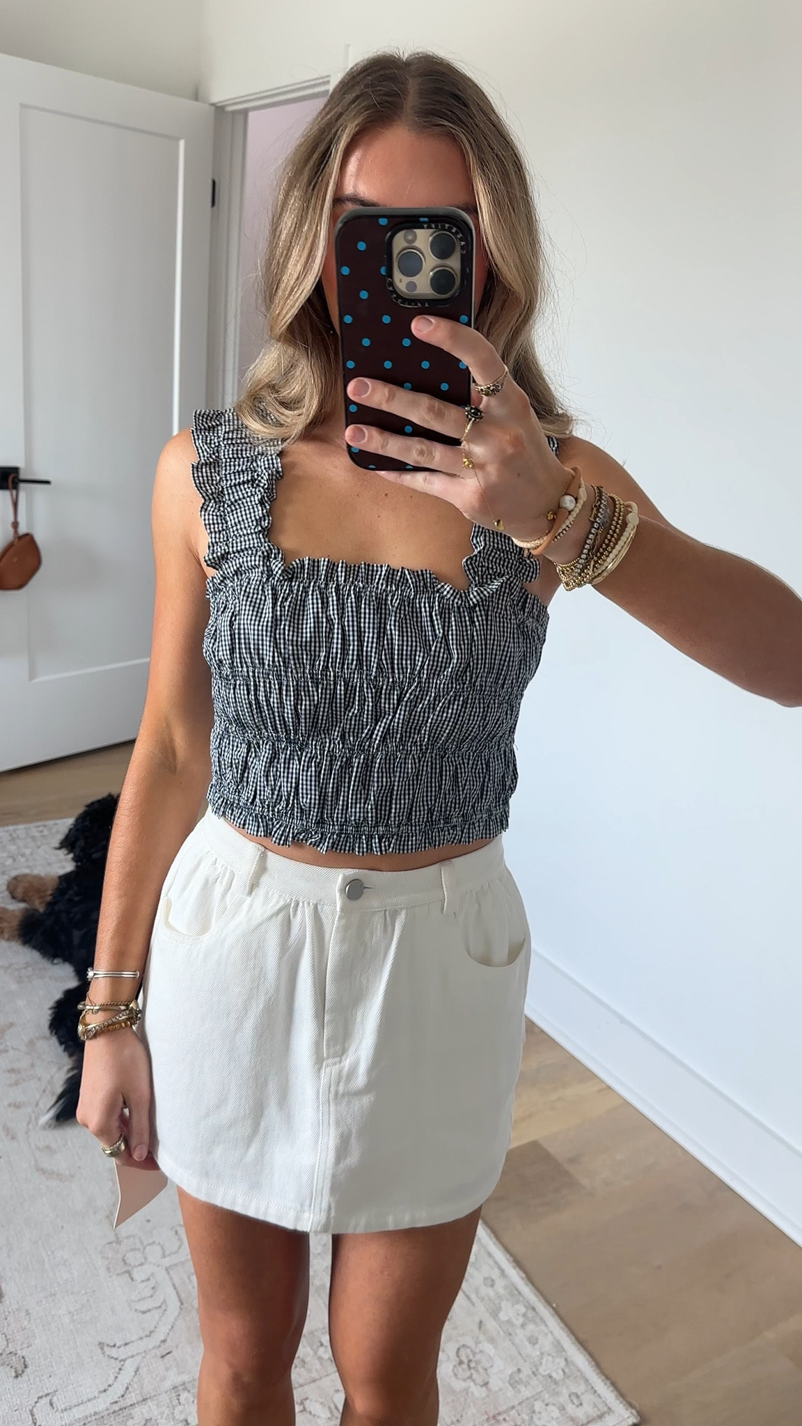 @englishfactory size xs Introducing our Smocked Gingham Ruffle Tank Top, a fresh take on a classic gingham print. Designed with a fully smocked bodice, this top offers a flattering, close fit with soft texture throughout. The ruffled straps and subtle cropped length add a feminine touch, while the clean square neckline keeps the look modern. Lightweight and easy to style, it pairs effortlessly with the matching skirt or your favorite high-rise bottoms. A versatile piece that feels both polished and relaxed.

#LTKSeasonal #LTKgrwm #LTKootd