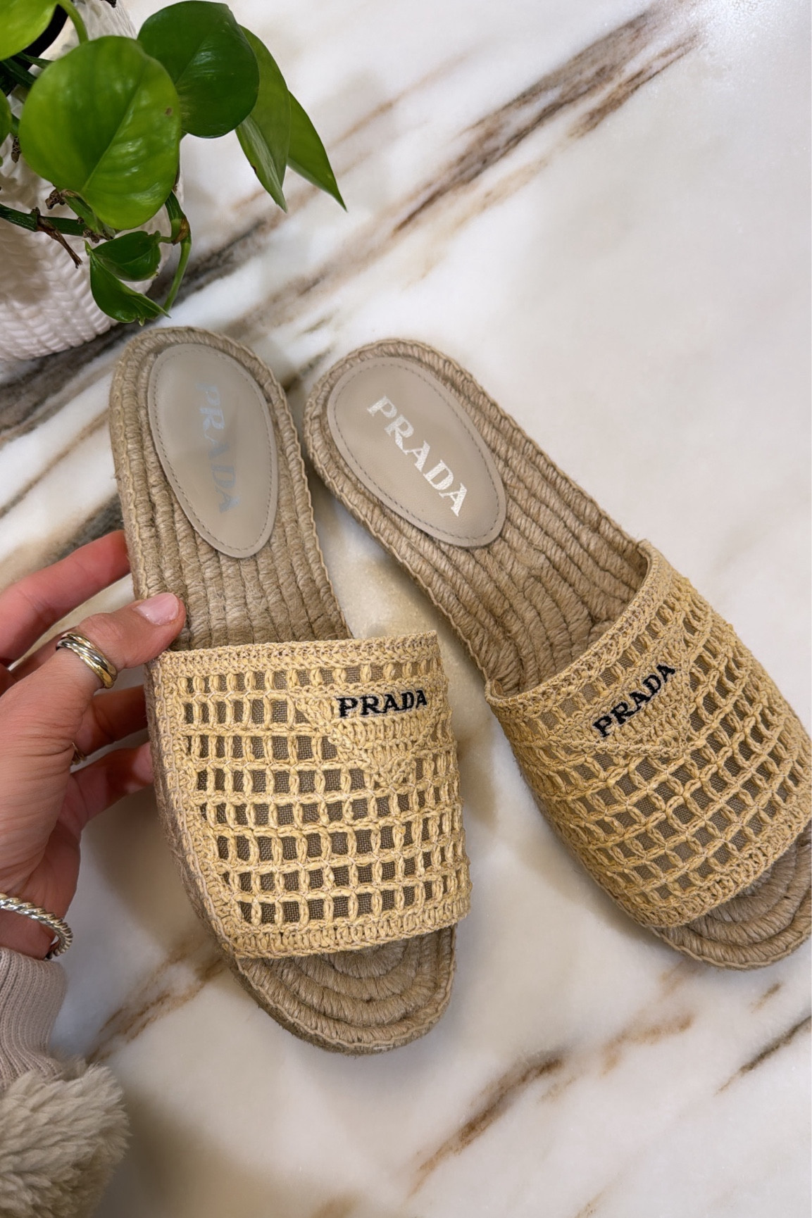 Prada ráfia slide sandals 
Resortwear 

#LTKSeasonal #LTKshoecrush #LTKstyletip