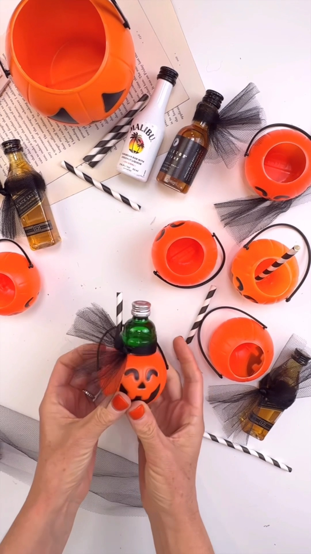 🎃🍹 Spike the punch…Halloween style.
This DIY Jack O’ Lantern Tower is more than décor—it’s a mini boozy bar that doubles as a spooky party favor.
 
Here’s how it works:
➡️ Cut + stack your pumpkins, top with florals for a festive finish 🌸🎃
➡️ Fill each jack-o’-lantern with a mini bottle + straw (tied with tulle!) 🍾🎀
➡️ Guests grab their pick → add it to the punch for an instant cocktail 🍹🦇 or take one home as a spooky little favor.
 
Why pour from one bottle when you can turn it into an experience?
🕸 Drop a 🎃 if you’d try this at your Halloween bash!
#halloweencocktails #halloweendiy #partyhack #halloweendecor #halloweenpartyideas

#LTKHalloween #LTKSeasonal #LTKParties