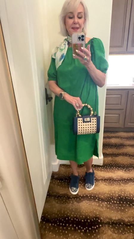 Green a color of the season. 
Chico’s denim rhinestone denim sneakers are so fun to wear with dresses, jeans, skirts or shorts.
Bag by @soliandsun 
Earrings by @kendrascott