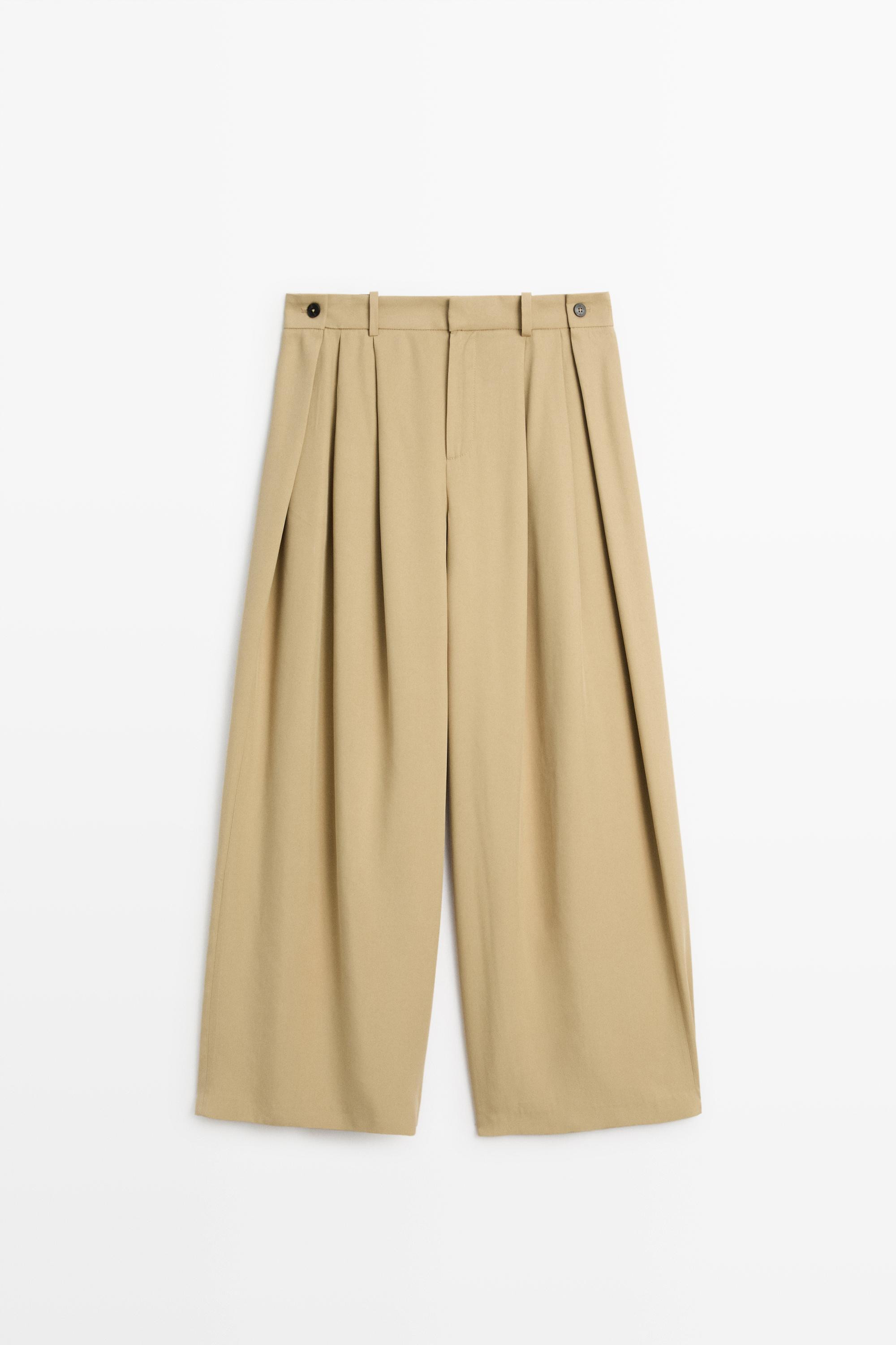 Flowing pleated pants with button detail | Massimo Dutti UK