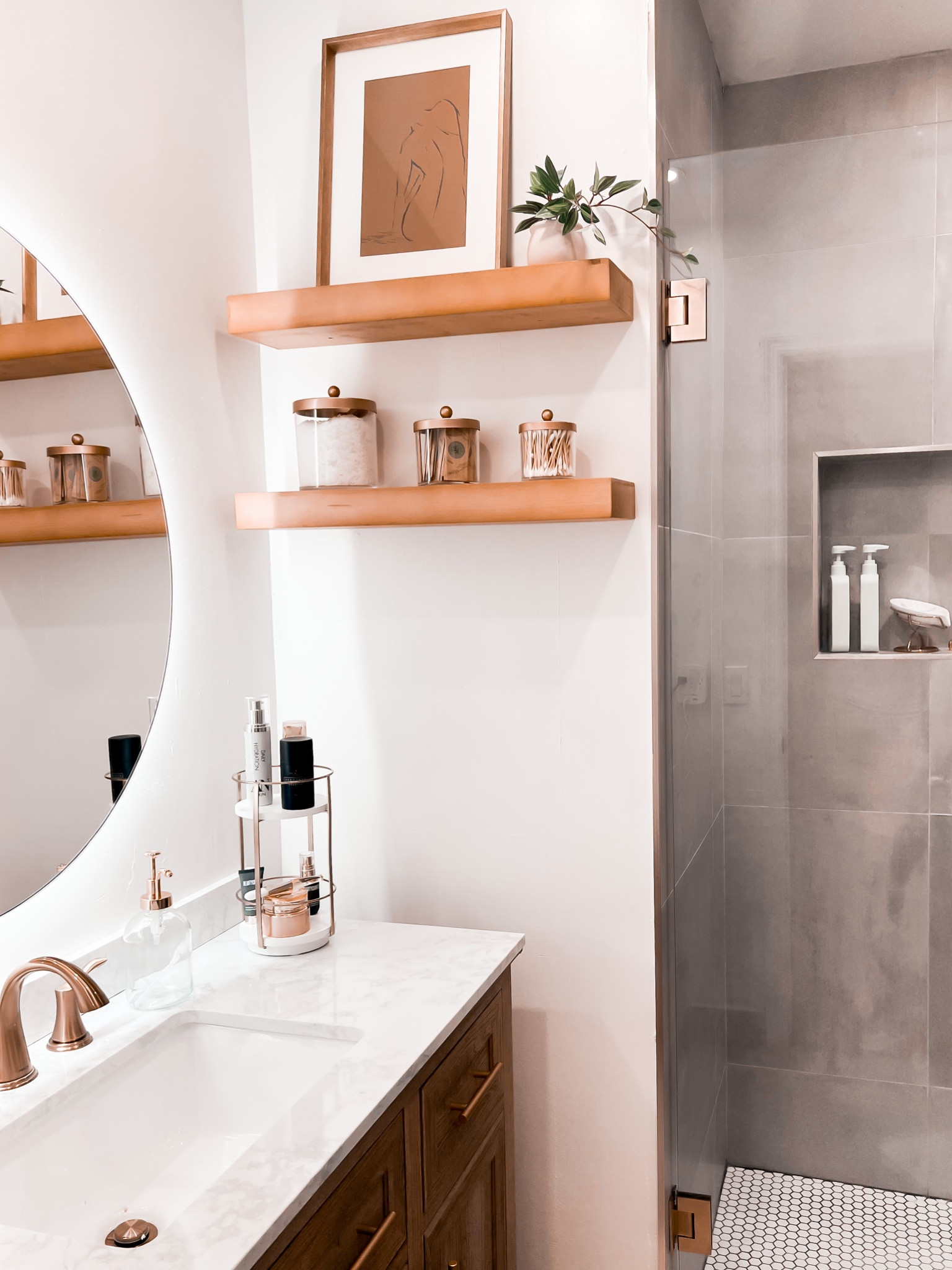Bathroom Reno #homedecor #bath #bathorganization #shelves #fakeplant #bathdecor #beautyproduxts #mirror #LTKunder100

#LTKhome #LTKstyletip