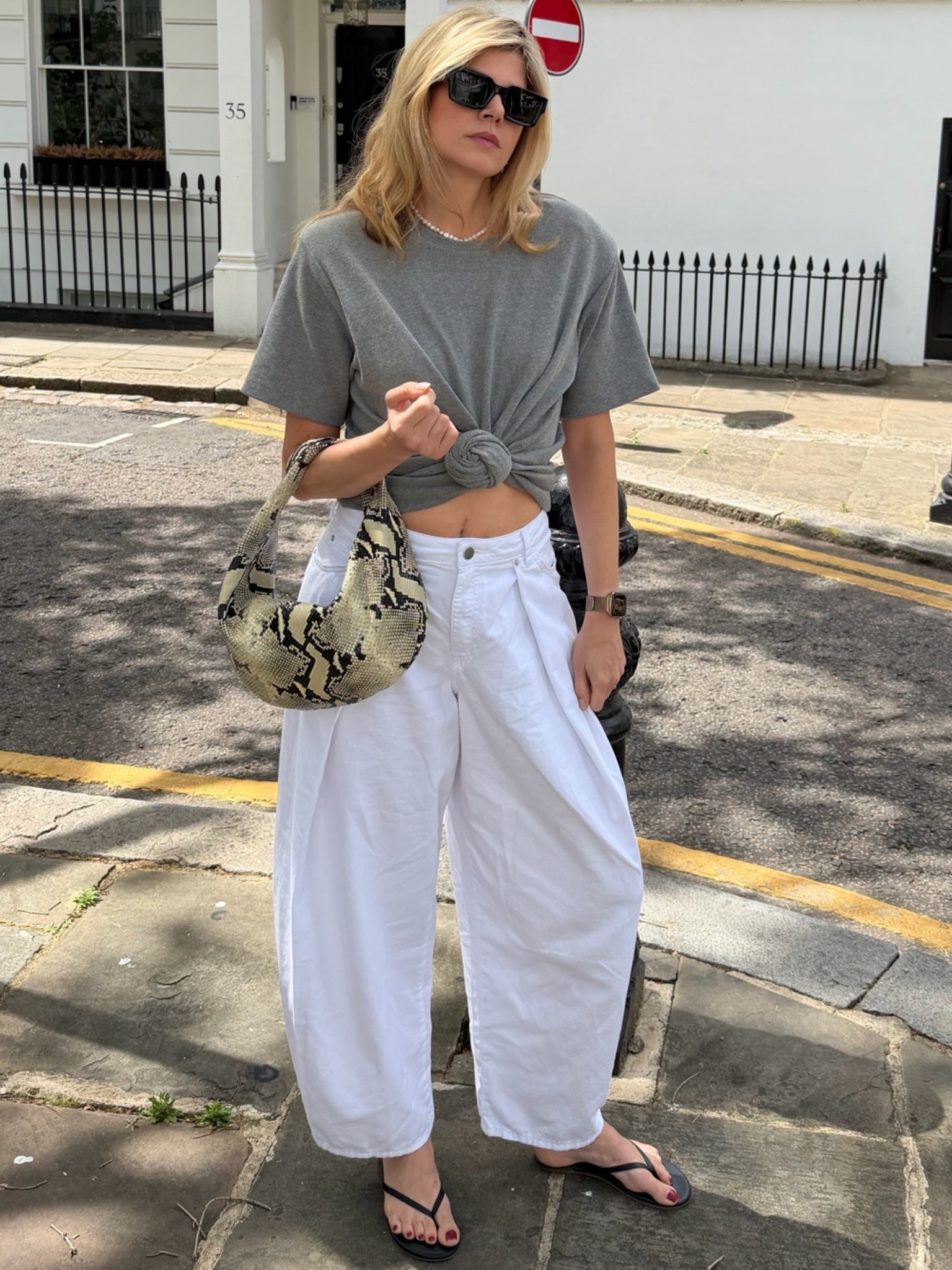 White jeans, Zara jeans, Khaite bag, snake print bag, flip flops, holiday outfit, summer outfit, airport outfit

#LTKsummer #LTKfestival #LTKuk
