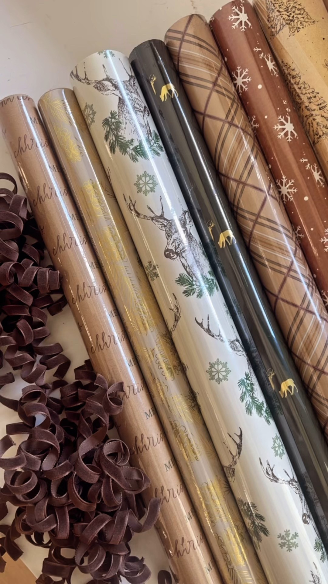 Just some of the Walmart Holiday Time wrapping paper options I picked up for this year. Sticking with the Browns, creams, deep greens, and gold theme again.

#LTKFamily #LTKSeasonal #LTKHome