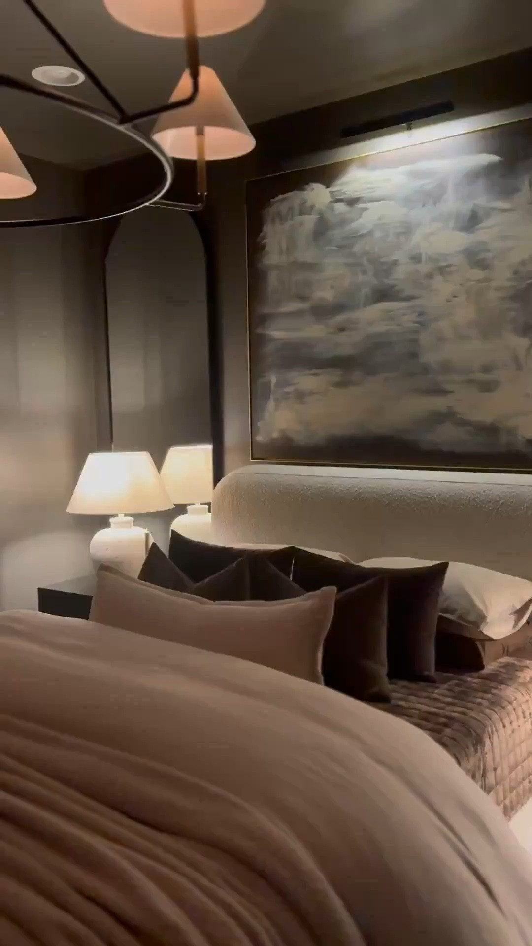 The paint color in the moody bedroom has quickly become my favorite! It completely transformed the space alongside the updated furniture. Now, the room exudes a cozy, elegant, and much richer vibe. The addition of the curved bed frame has also beautifully softened the space. I'm absolutely thrilled with how it turned out! It’s truly one of my favorite rooms in my home. #homedecor #bedroominspo #bedroomdecorideas #amazonhome #bedroomtransformation #bedroombeforeandafter #beforeandafterfter 

#summerthompsonstyles

#LTKHome