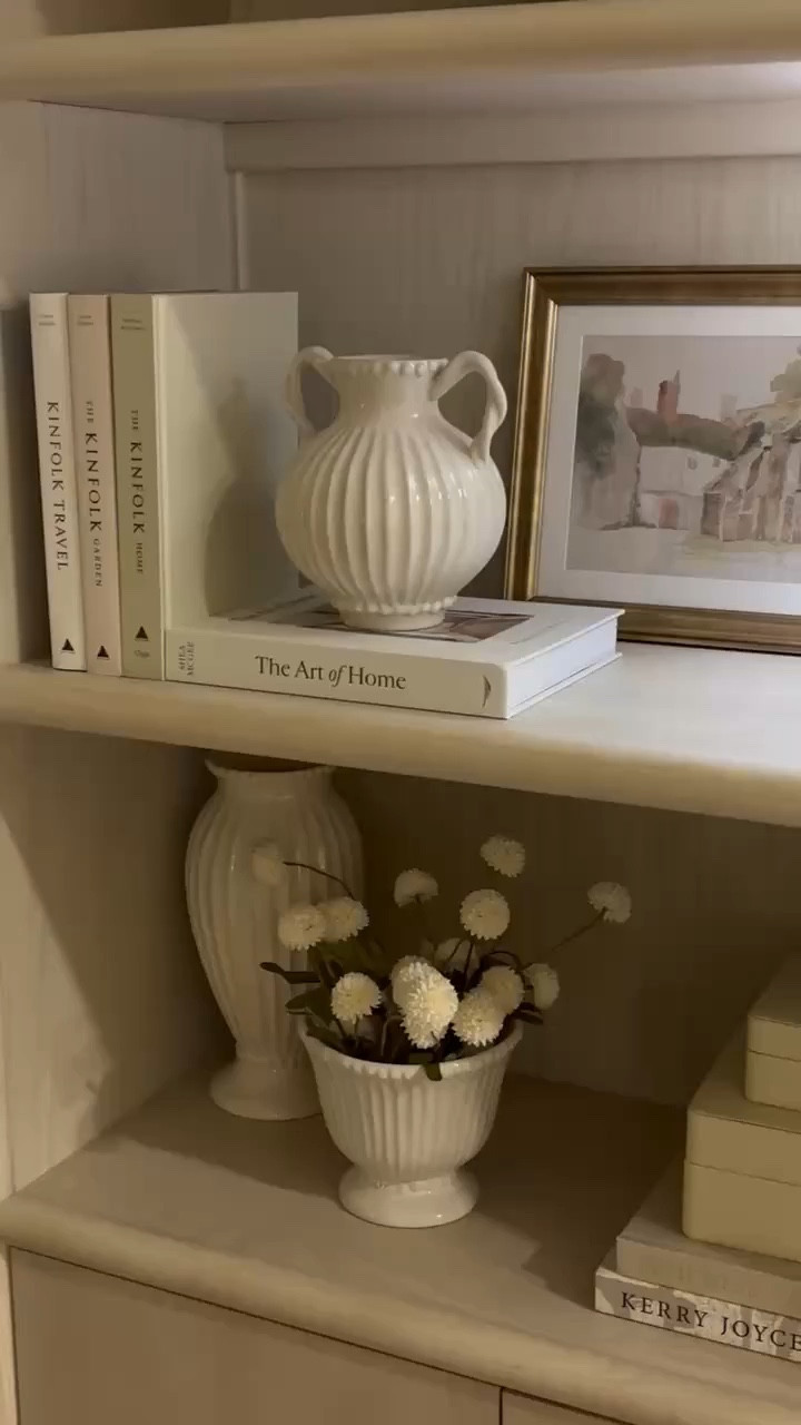 neutral bookshelf decor 🤍 

refreshed my cabinet for spring & love it so much! This lamp is on the pricier side for Target but it’s similar to a designer one and is such good quality!! 



Spring 2026, home decor, styling, interior design, minimalism, neutral, sidneymarieduke 

#LTKHome #LTKSeasonal