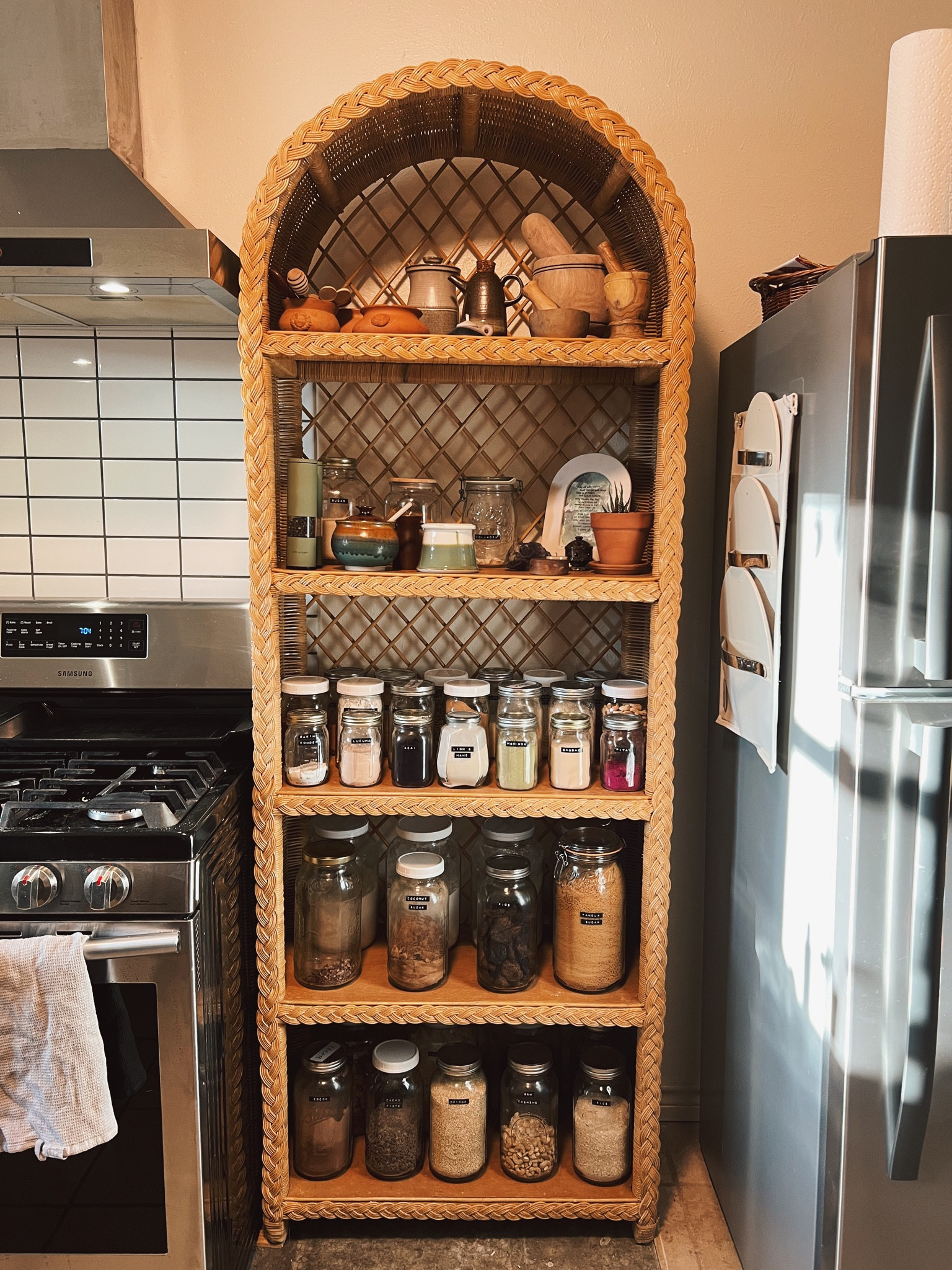 thrifted this gem of a vintage rattan shelf and turned it into a kitchen apothecary. i’ve been in need of a place to store all my jars of goods, cooking essentials and kitchen intentions ✨

#LTKunder50 #LTKhome