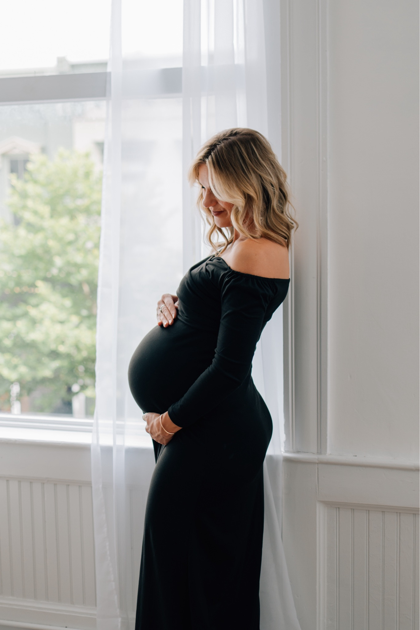 Loved this affordable black dress for my maternity shoot 

#LTKBump #LTKStyleTip #LTKFindsUnder50